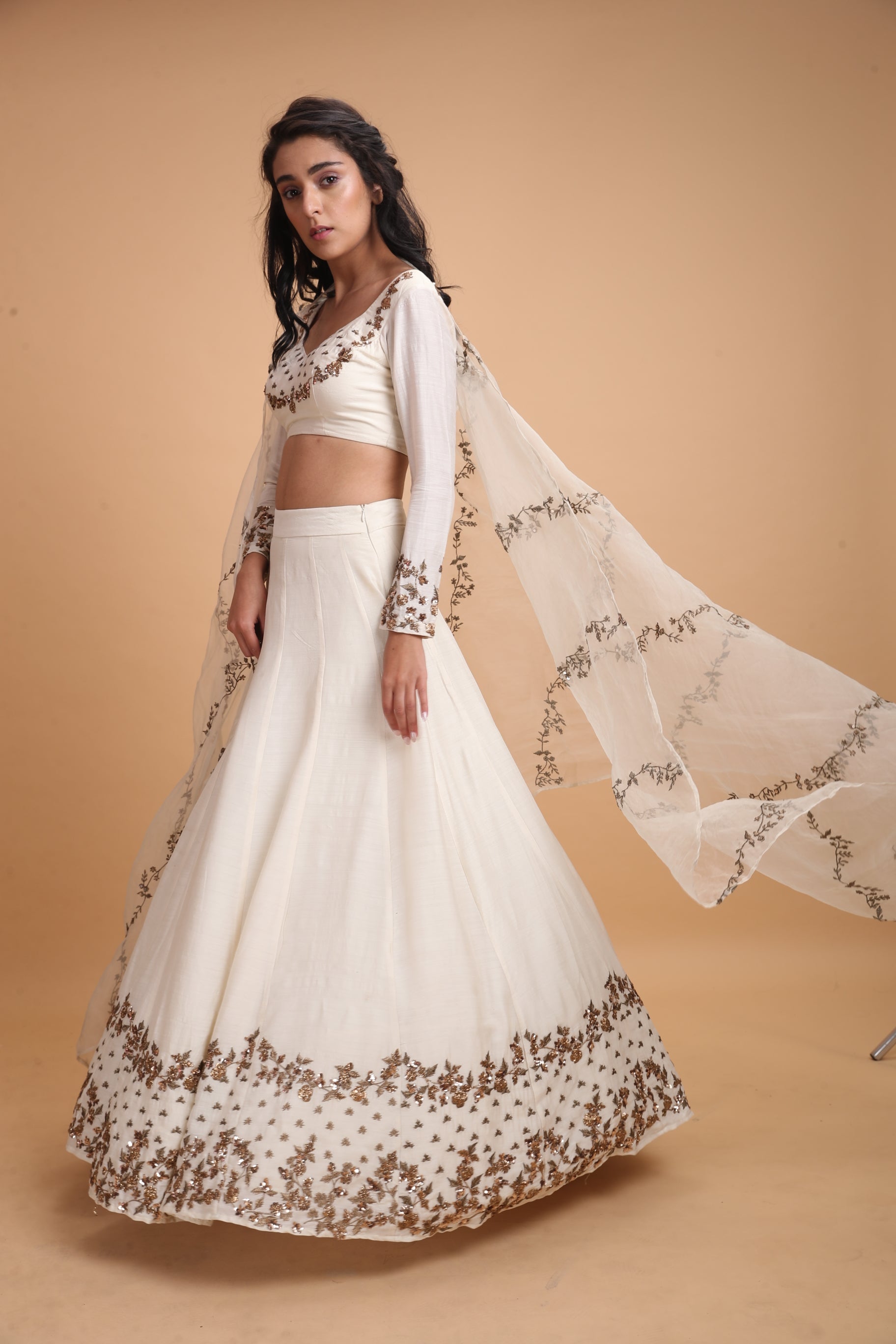 White Silk Lehenga With Dark Gold Work