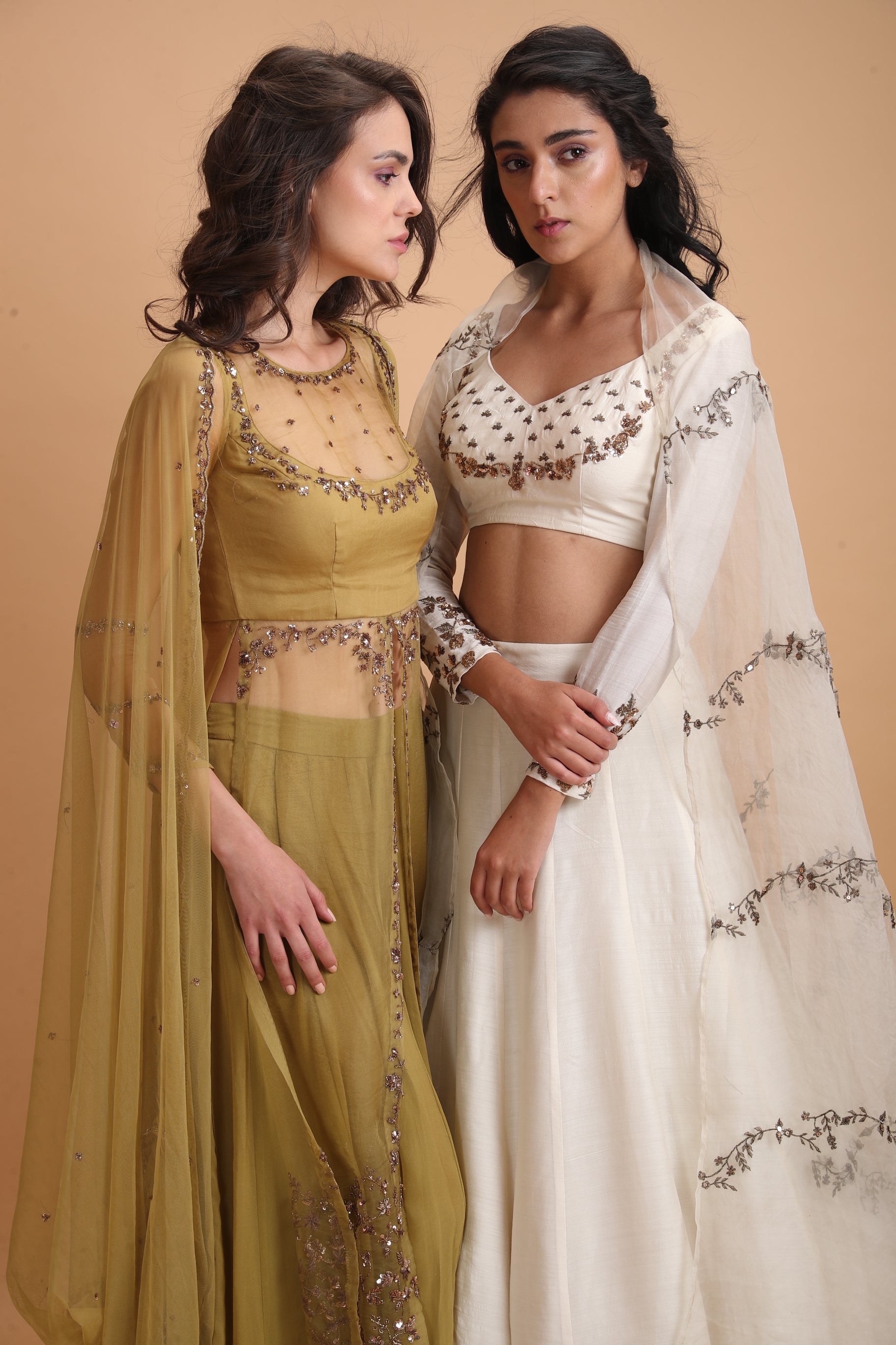 White Silk Lehenga With Dark Gold Work