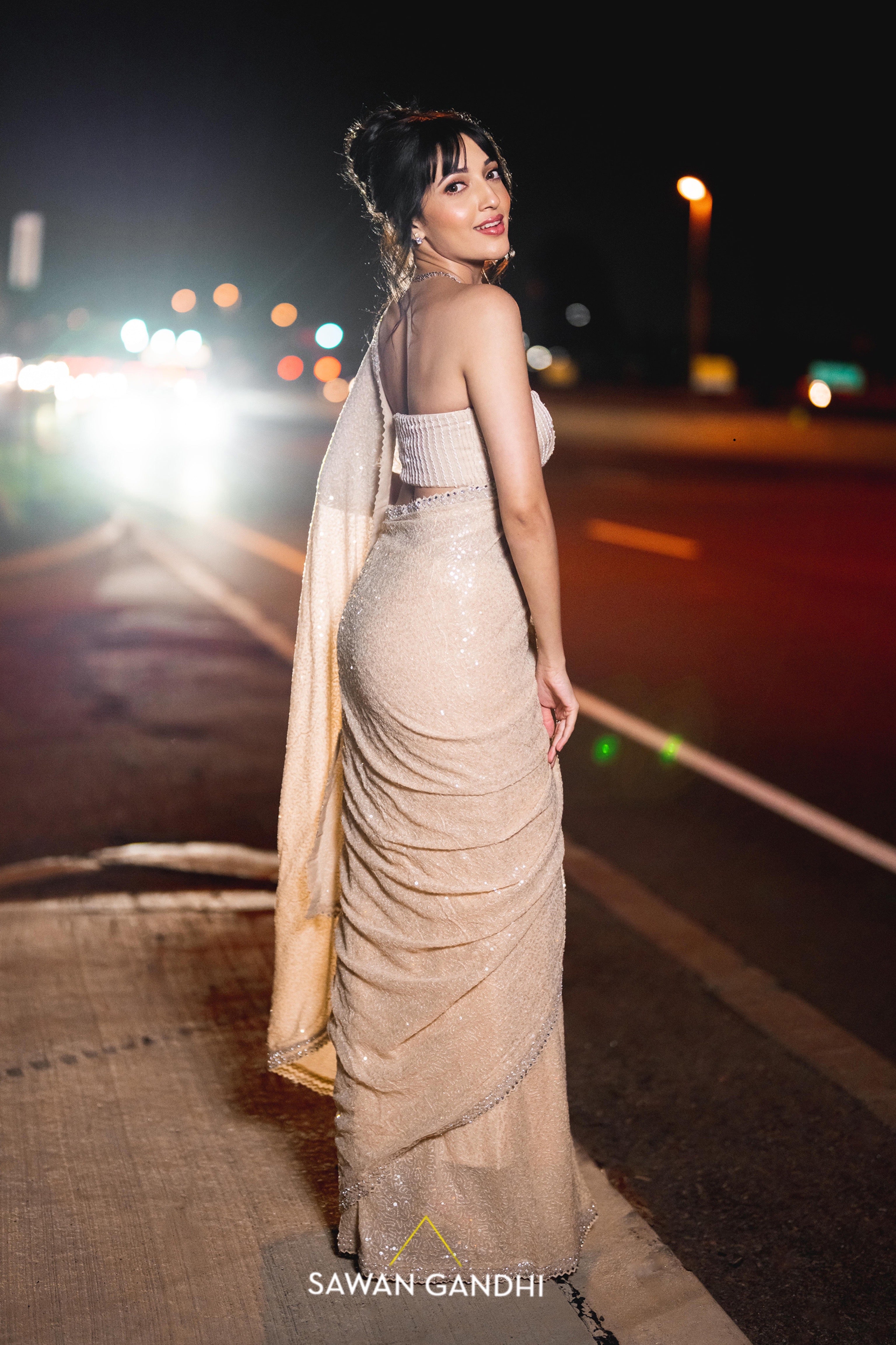 Neha Shetty In Beige sequins saree