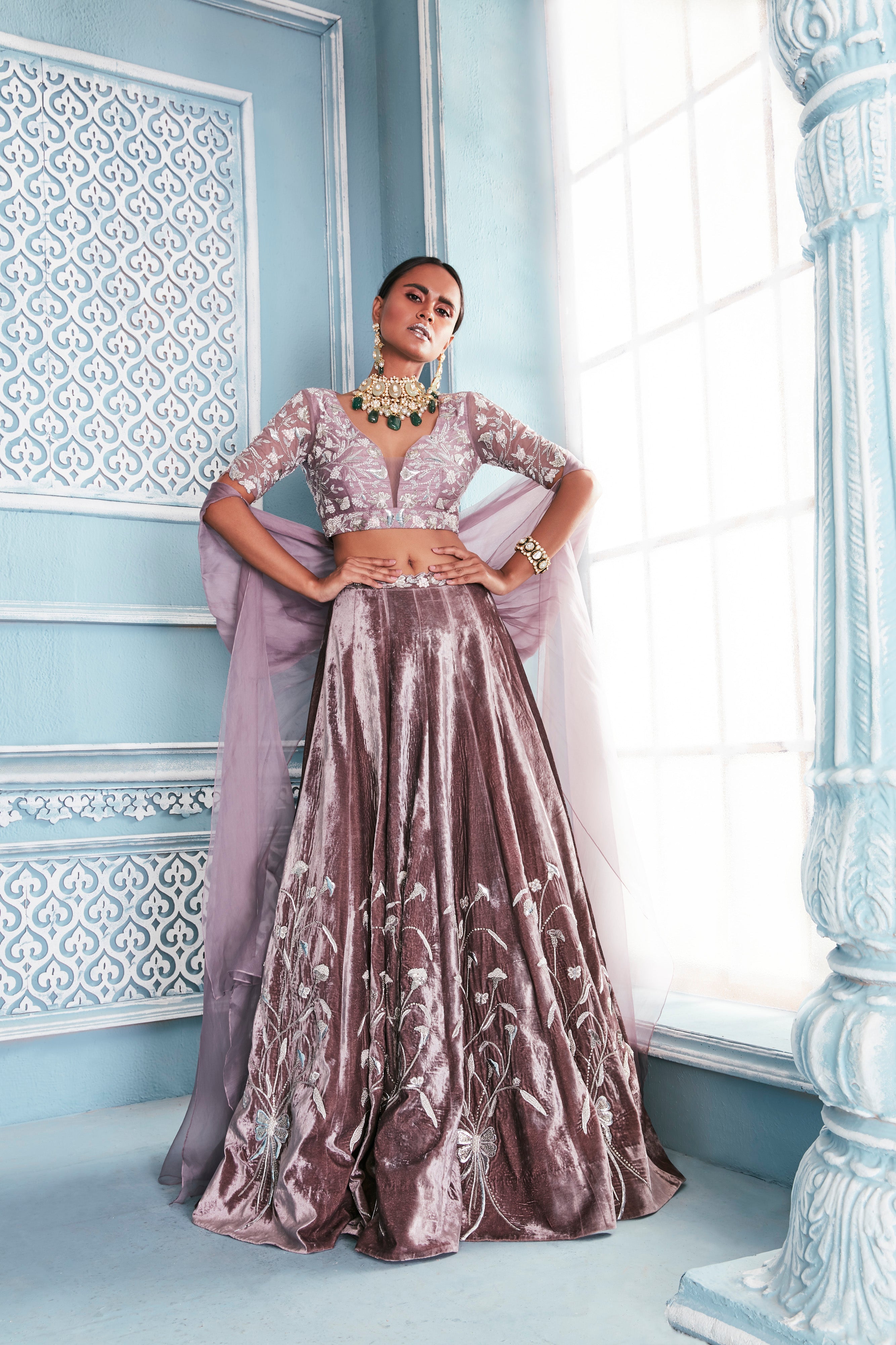 Razer Back Blouse With Velvet Tulip Lehenga Set