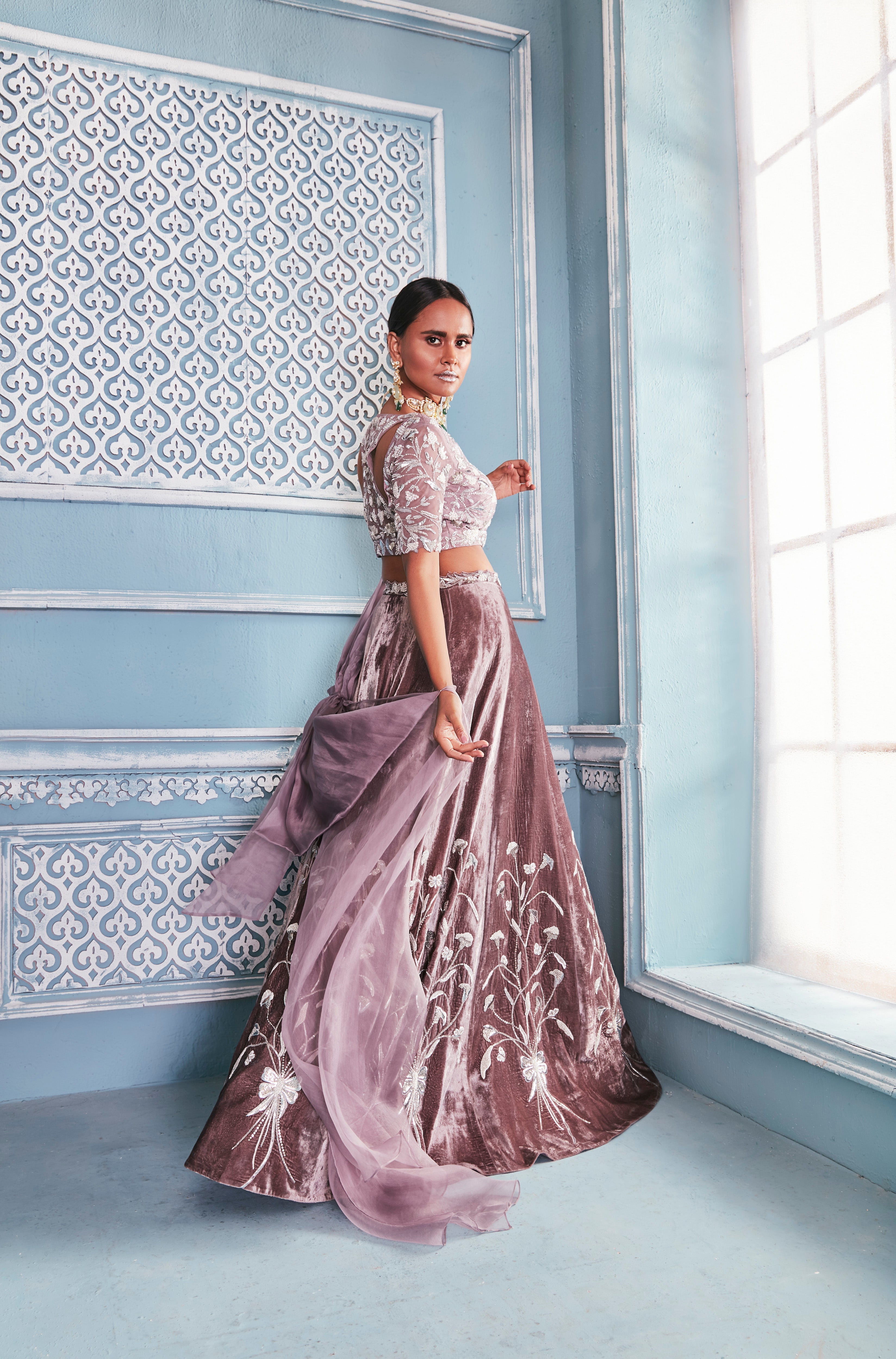 Razer Back Blouse With Velvet Tulip Lehenga Set