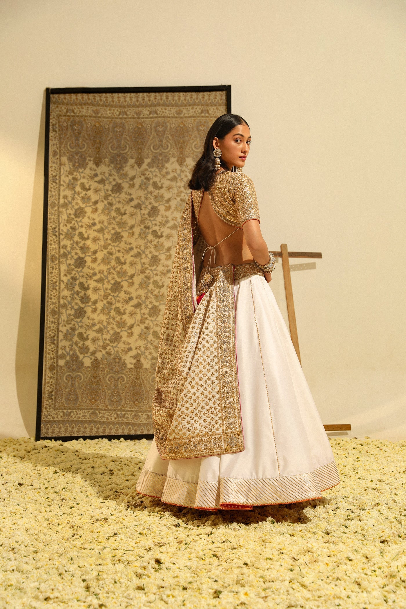 Dolly Jain In Aarif - Daisy Ivory Hand Embroidered Lehenga set with Odhni