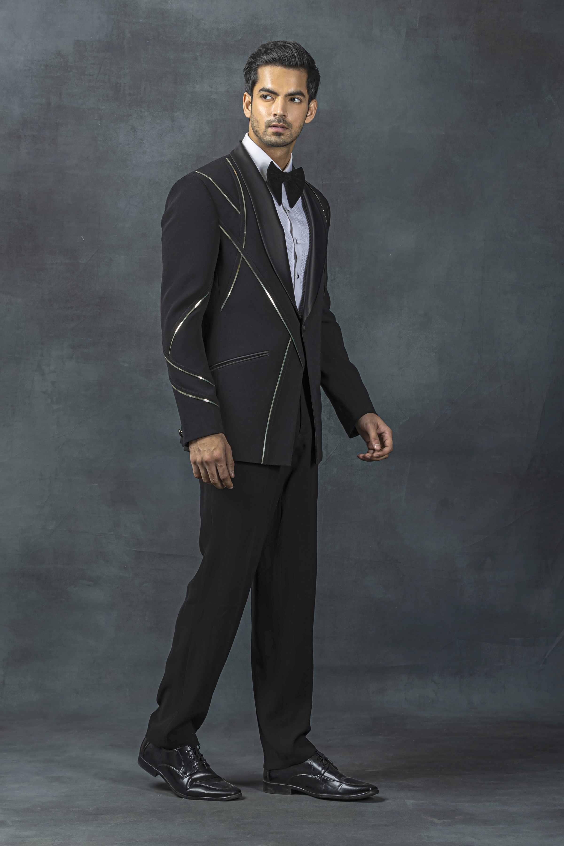 Black Tuxedo With Golden Reel Detailing