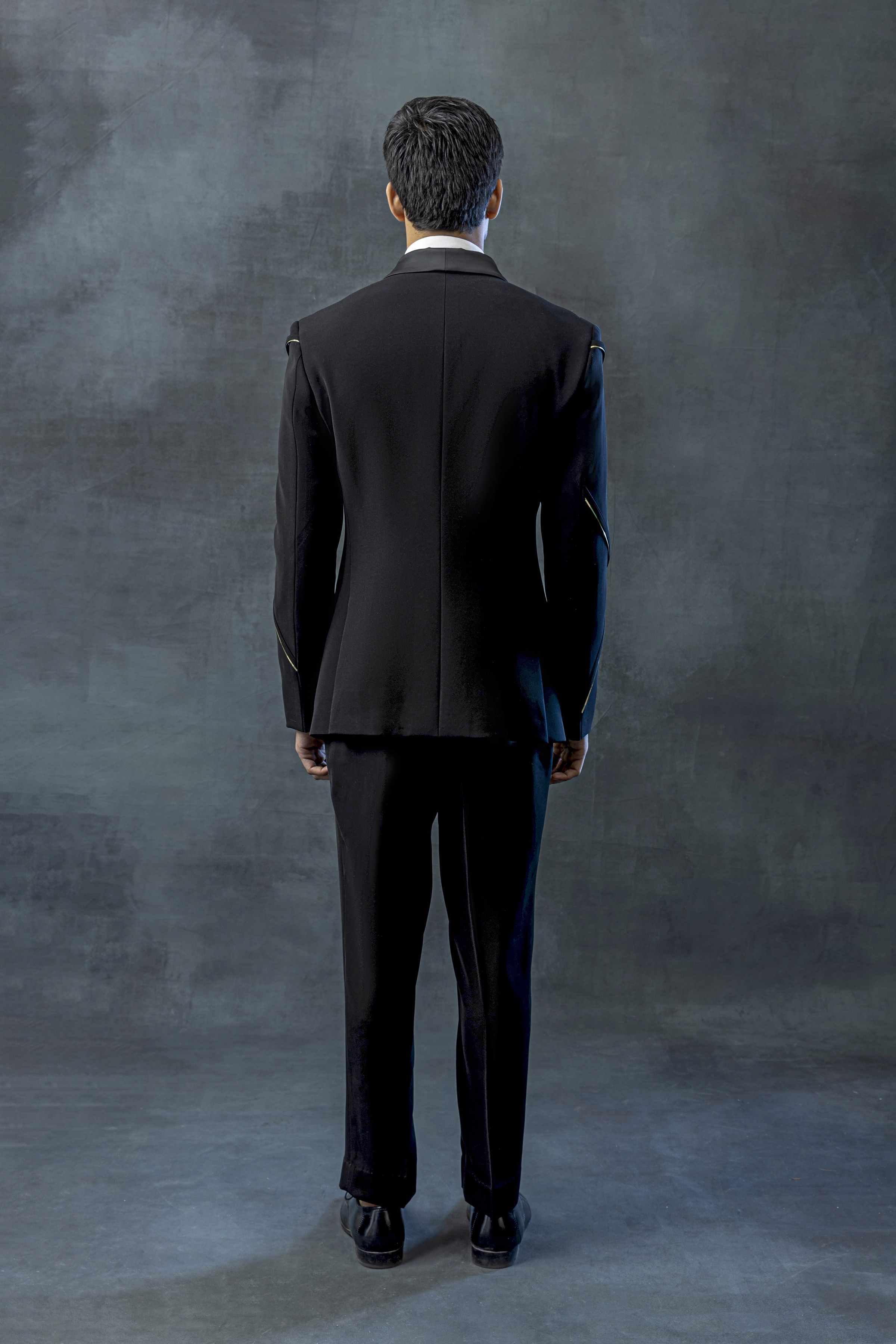 Black Tuxedo With Golden Reel Detailing