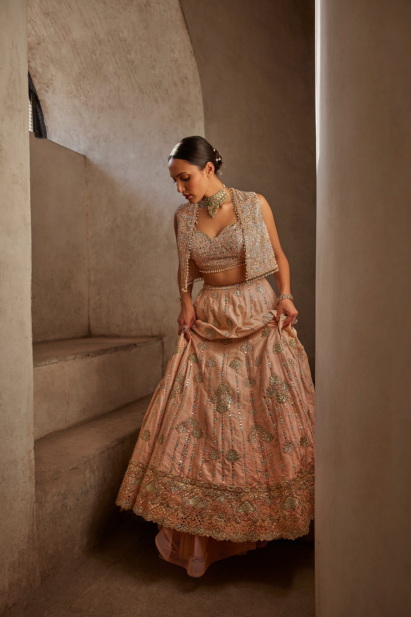 PEACH LEHENGA WITH SHORT JACKET AND BUSTIER