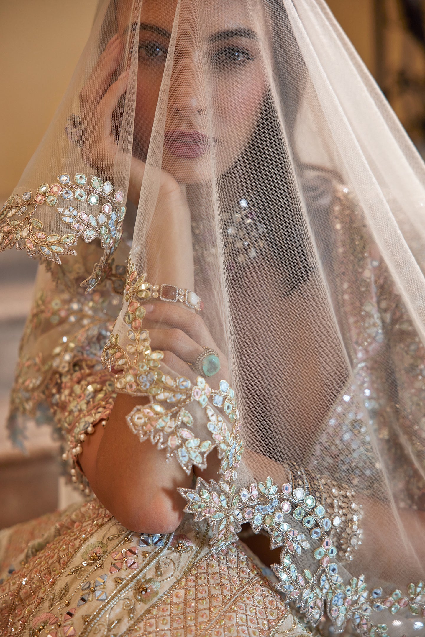 IVORY LEHENGA WITH MULTI COLOURED EMBROIDERY