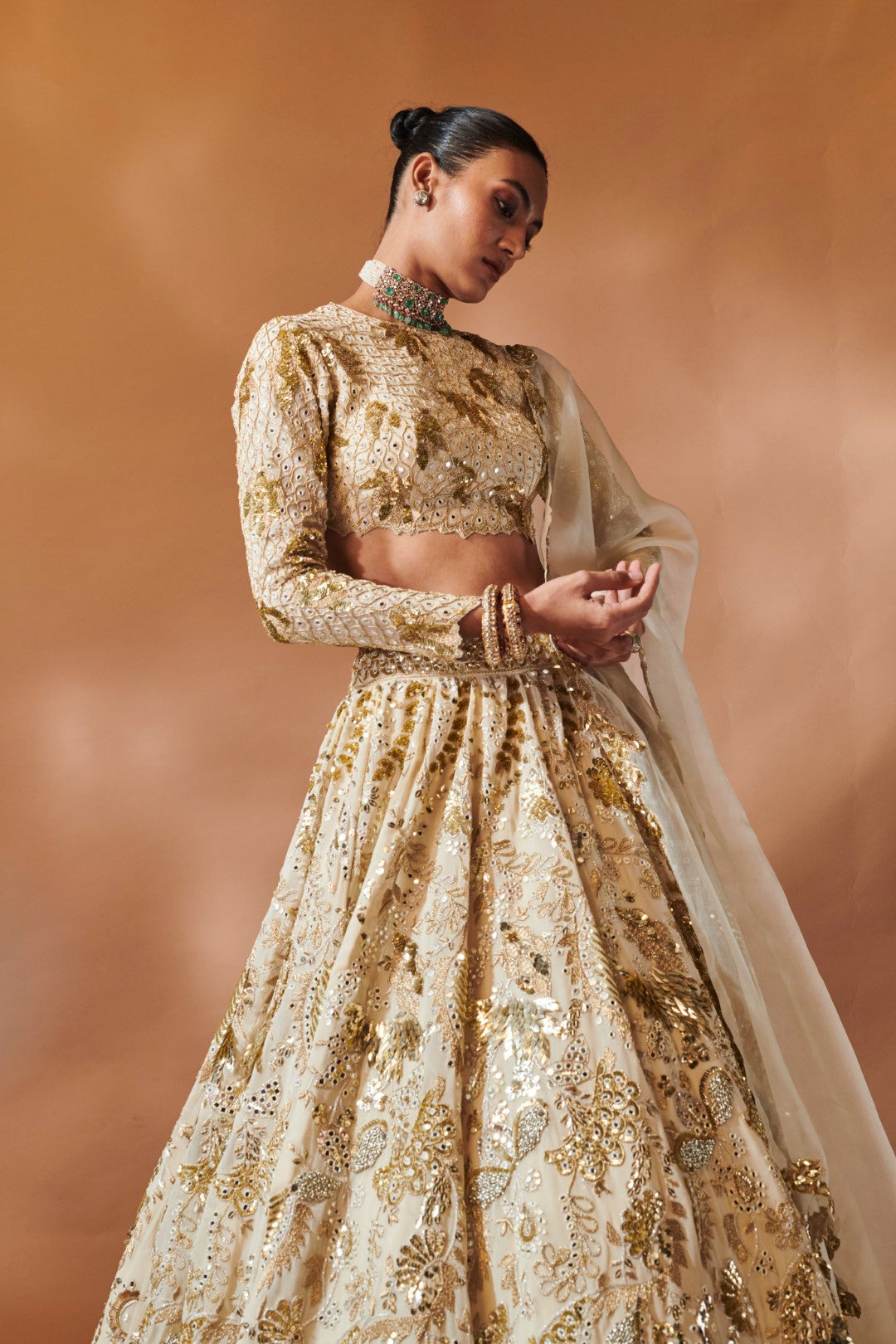 IVORY AND GOLD HEAVILY EMBROIDERED LEHENGA SET