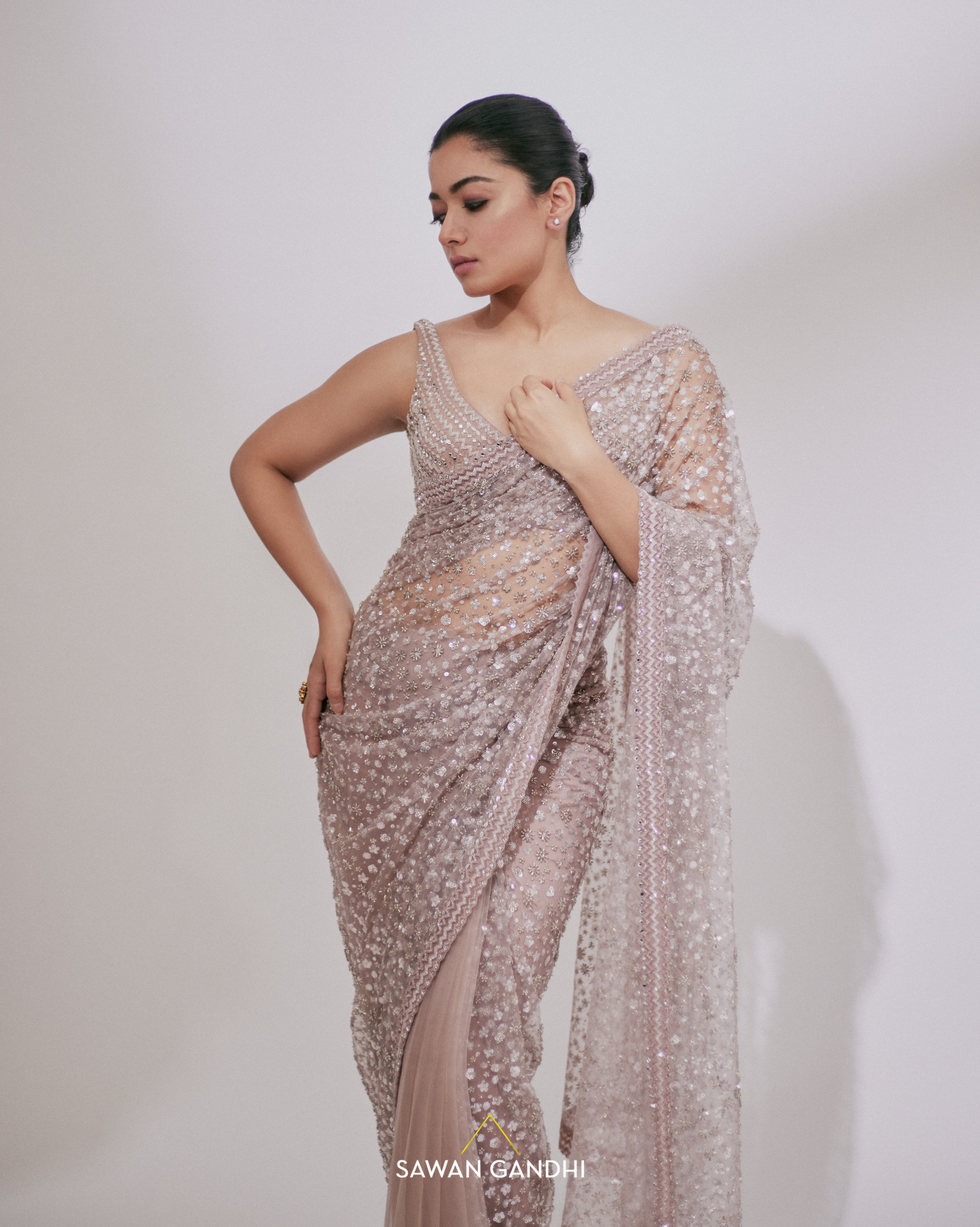 Rashmika Mandanna in Blush pink sequins andcutdana saree