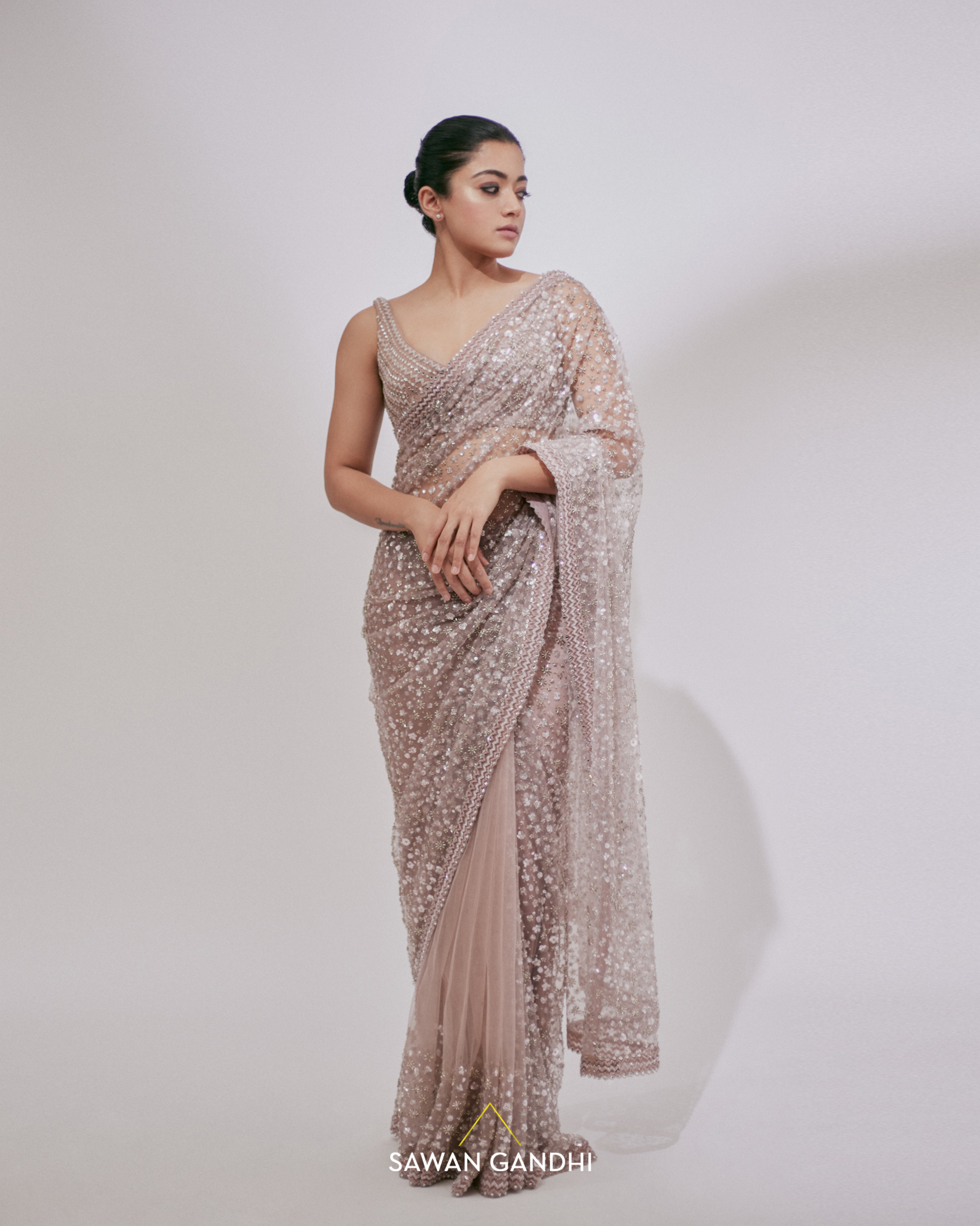 Rashmika Mandanna in Blush pink sequins andcutdana saree