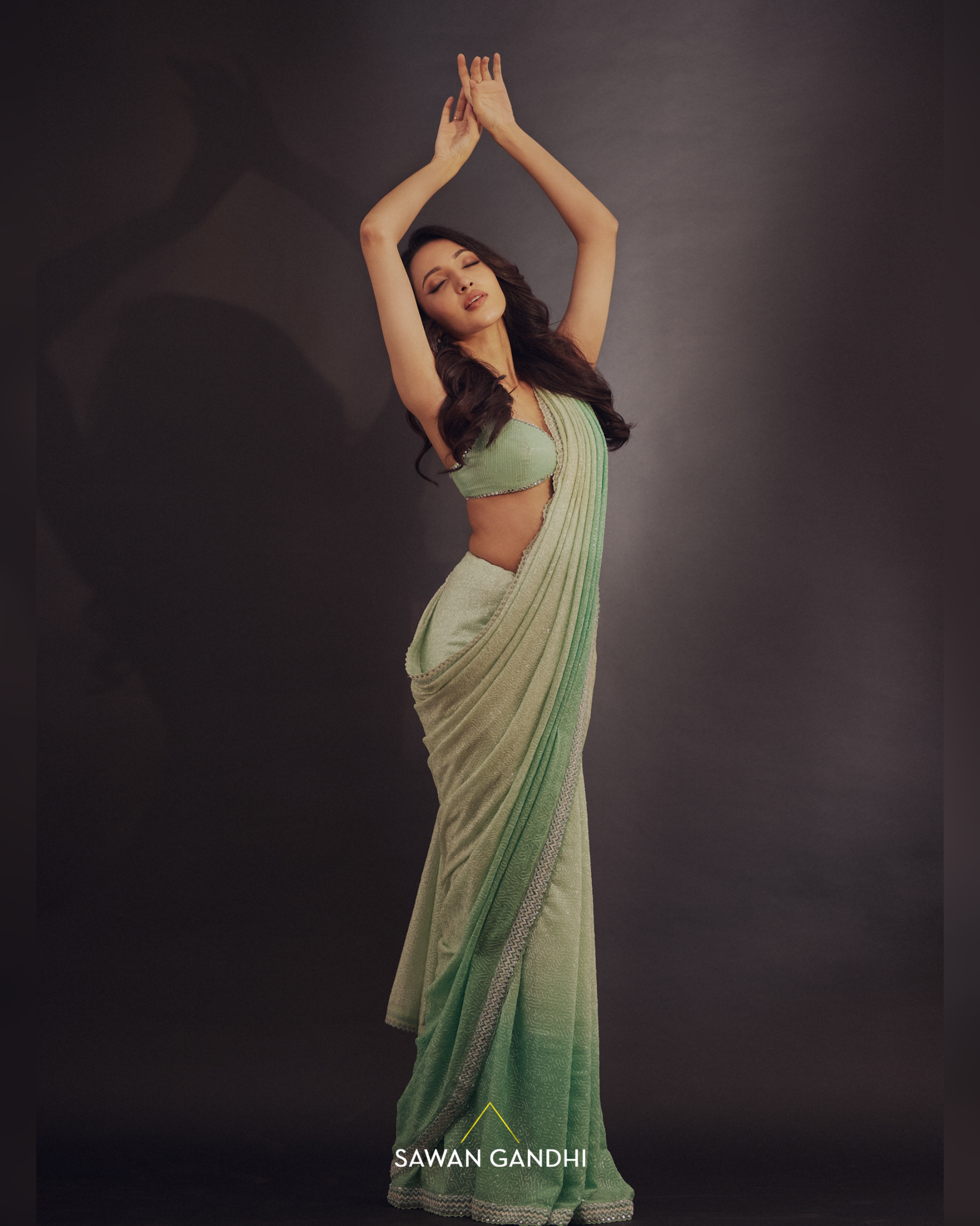 Neha Shetty in Sea green sequins ombre saree