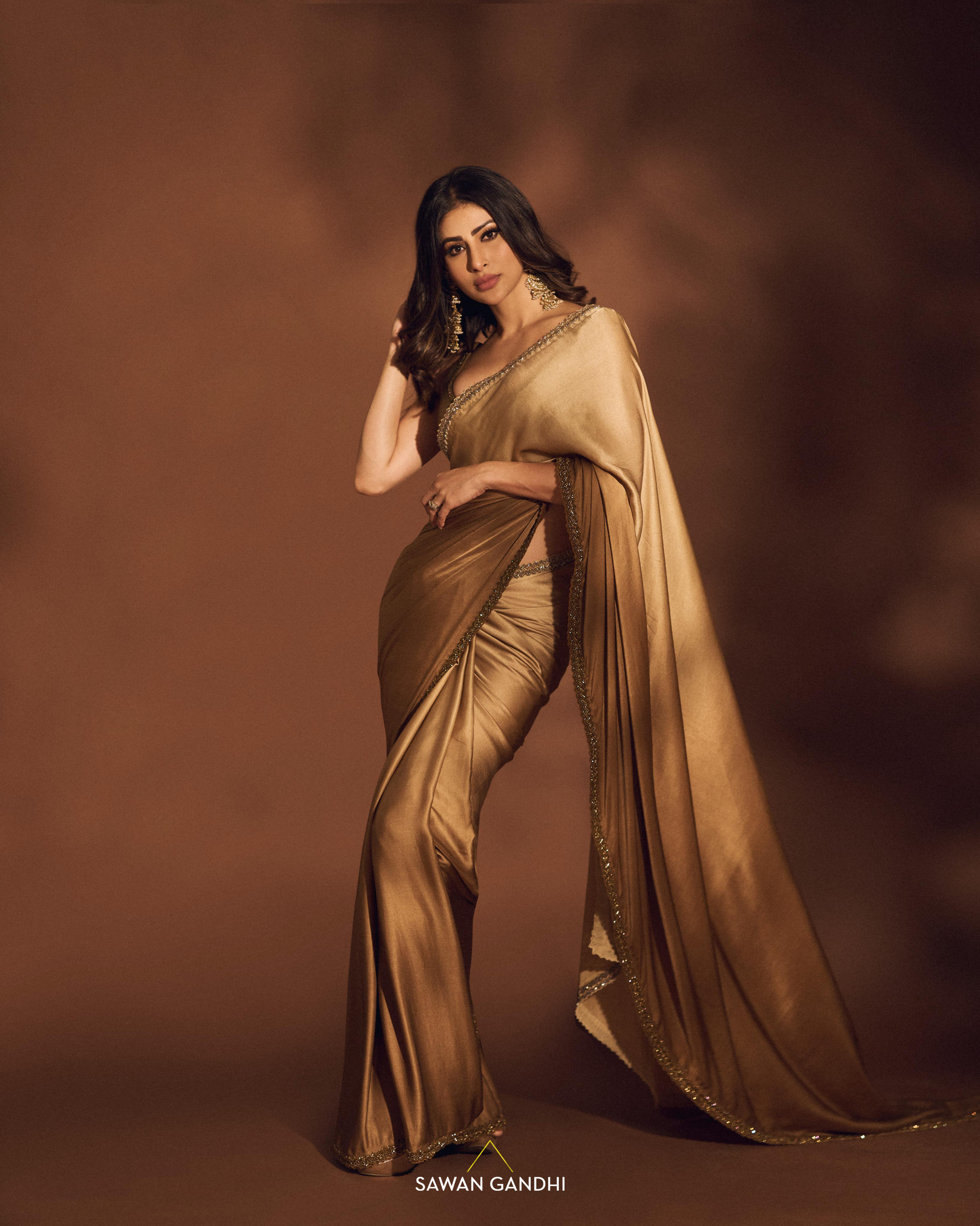 Mouni Roy in Gold ombrƩ saree