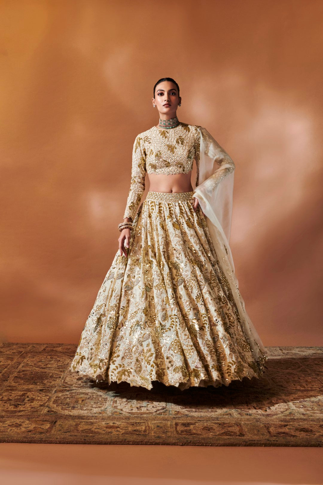 IVORY AND GOLD HEAVILY EMBROIDERED LEHENGA SET