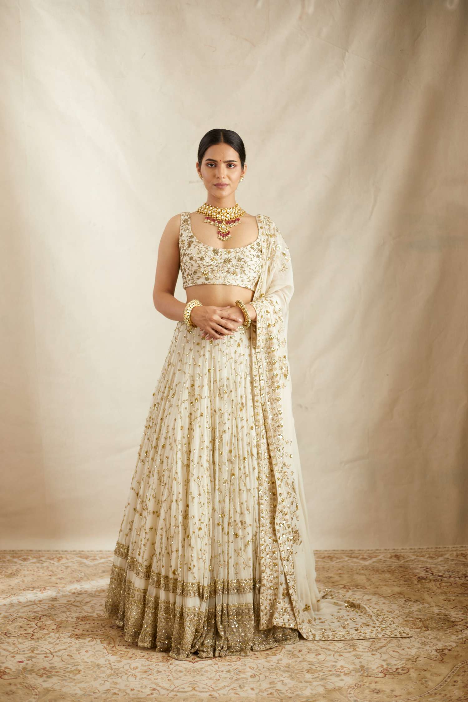 Off White Heavy Jaal Work Lehenga Set