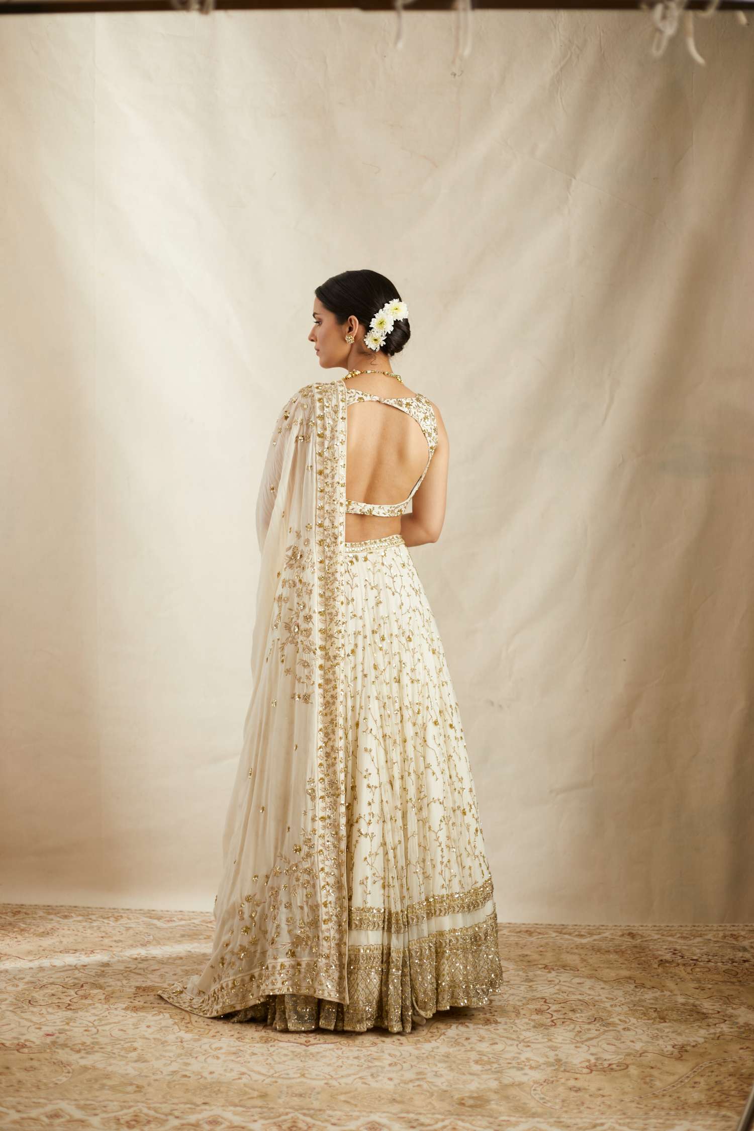 Off White Heavy Jaal Work Lehenga Set