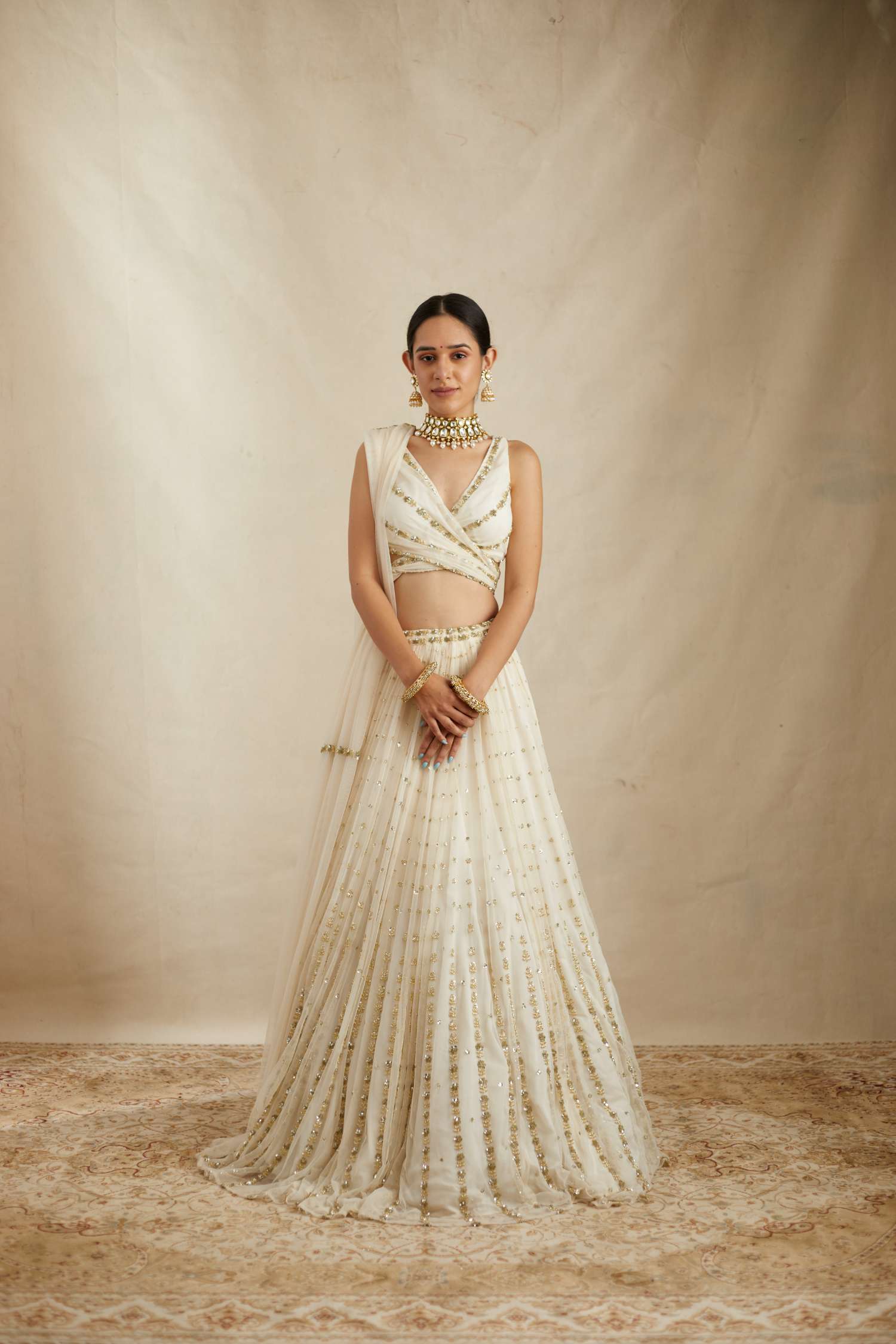 Off White Net Crepe Line Embroidered Lehenga Set
