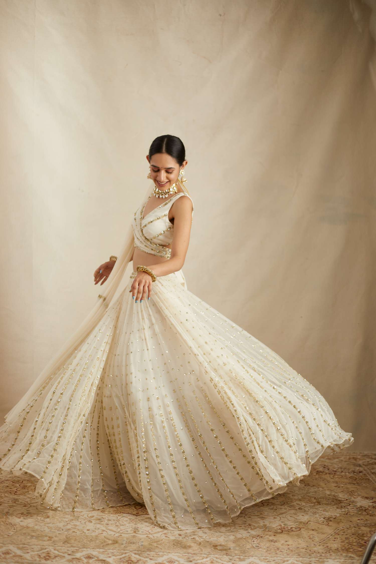 Off White Net Crepe Line Embroidered Lehenga Set