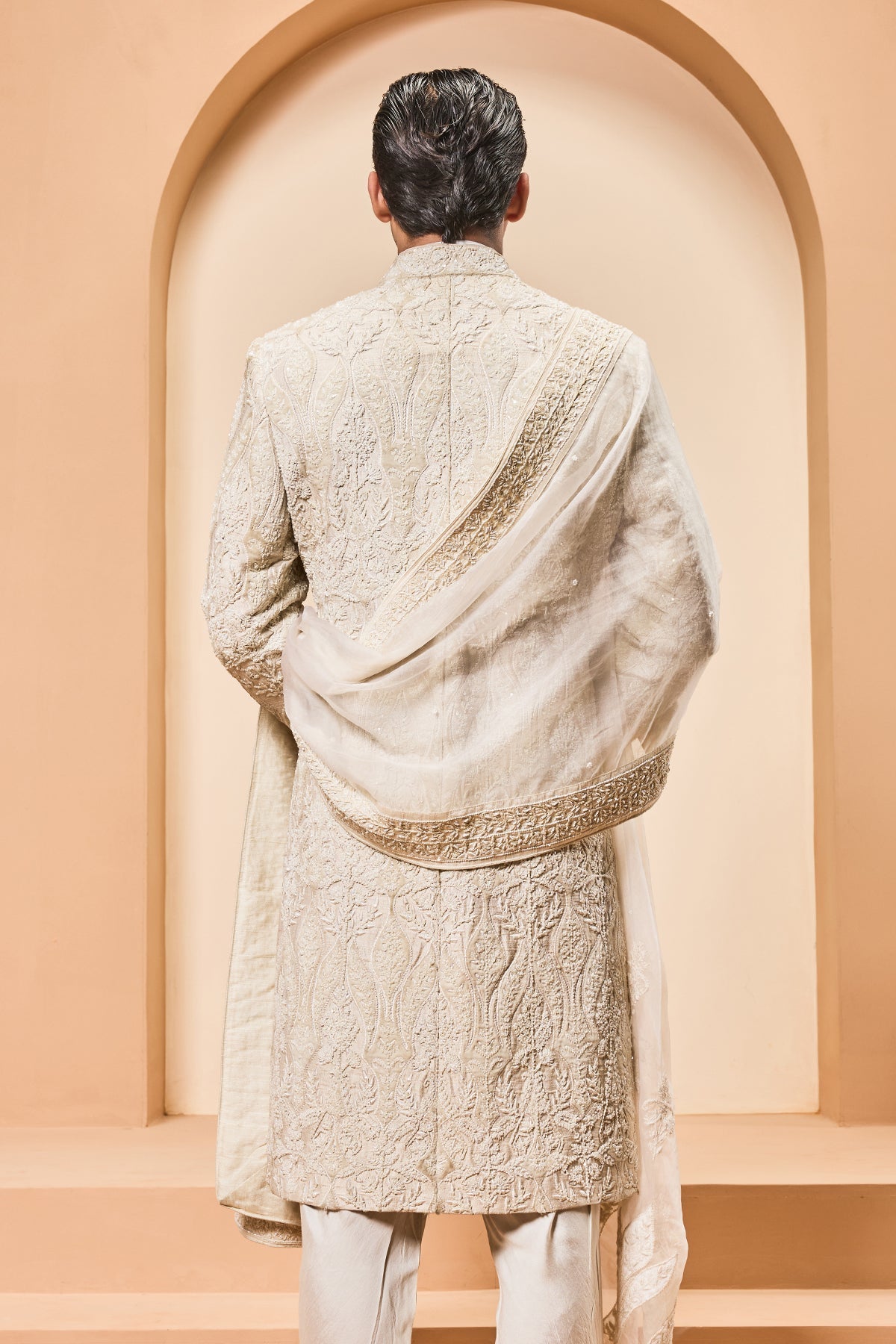 Ivory sherwani detailing with pearl sequins and aplic work