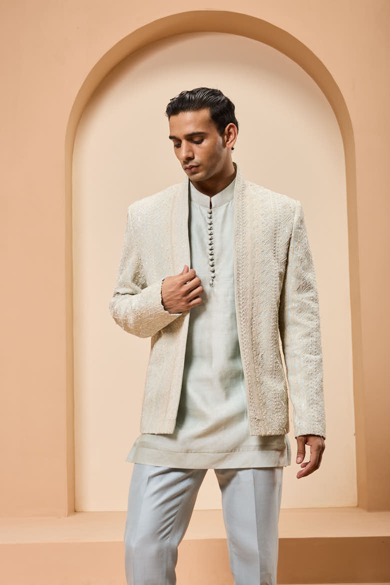 Powder blue open bandhgala 
with thread sequins & pearl
work