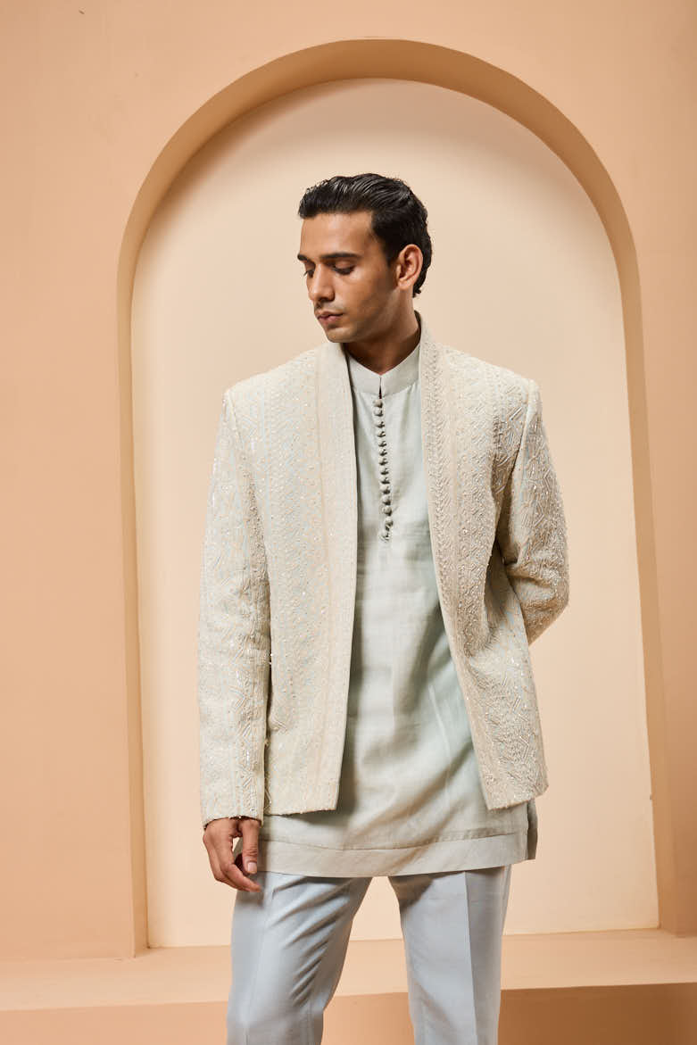 Powder blue open bandhgala 
with thread sequins & pearl
work