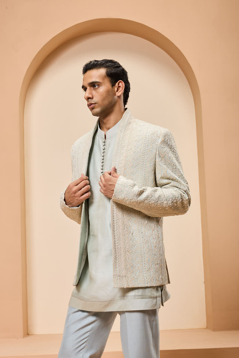 Powder blue open bandhgala 
with thread sequins & pearl
work