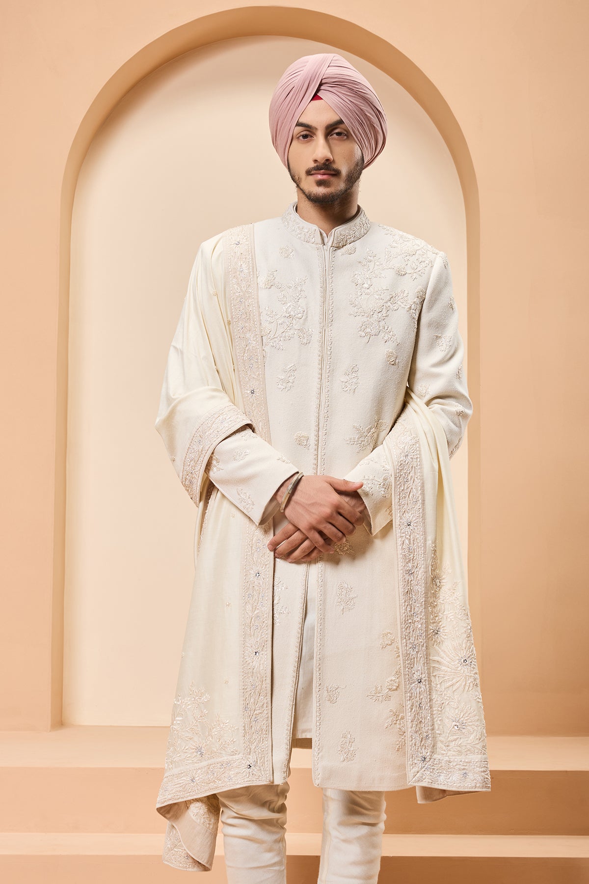 Ivory sherwani detailing with sequins and with thread work