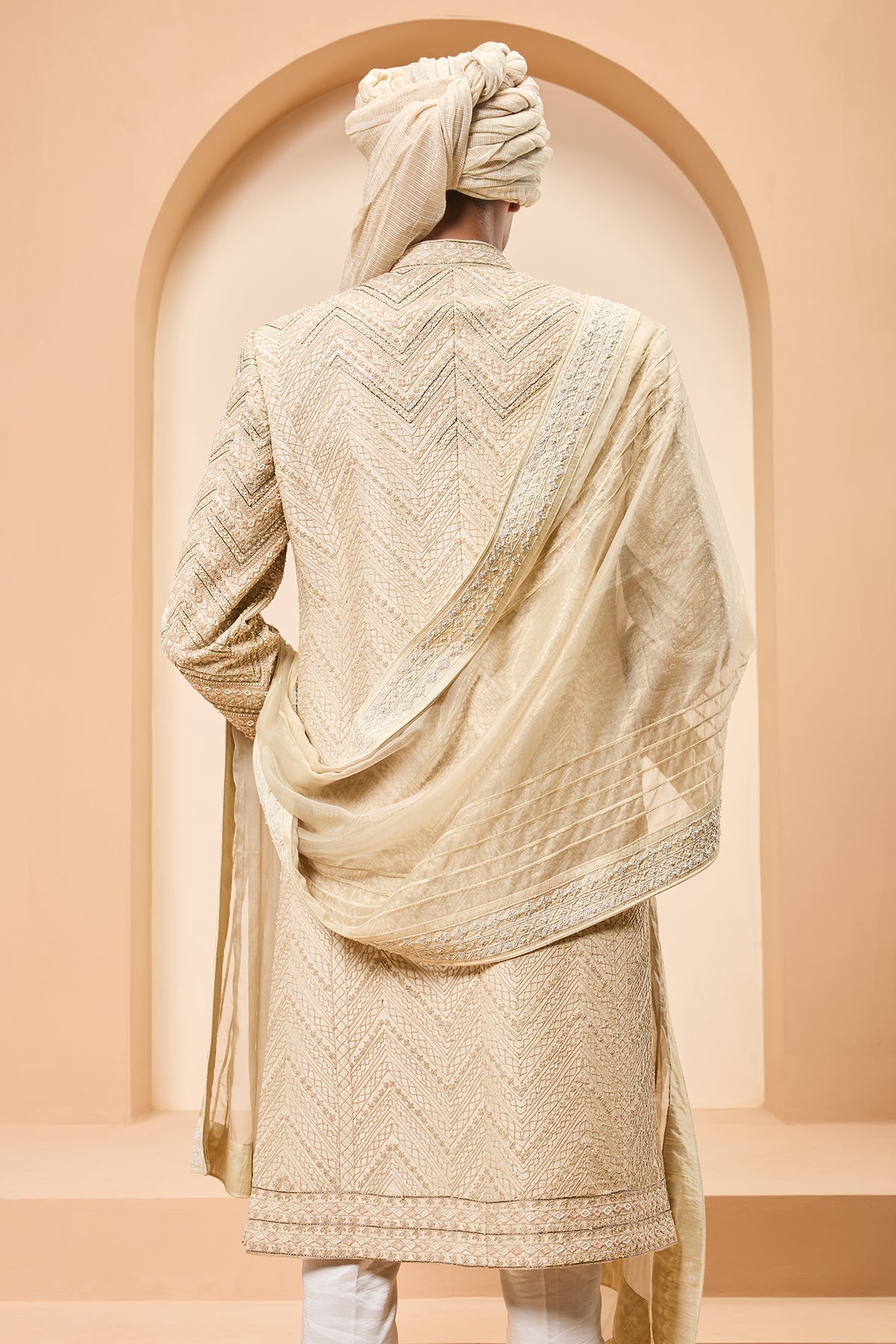 Ivory gold sherwani detailing with zardozi pearl sequins and thread work