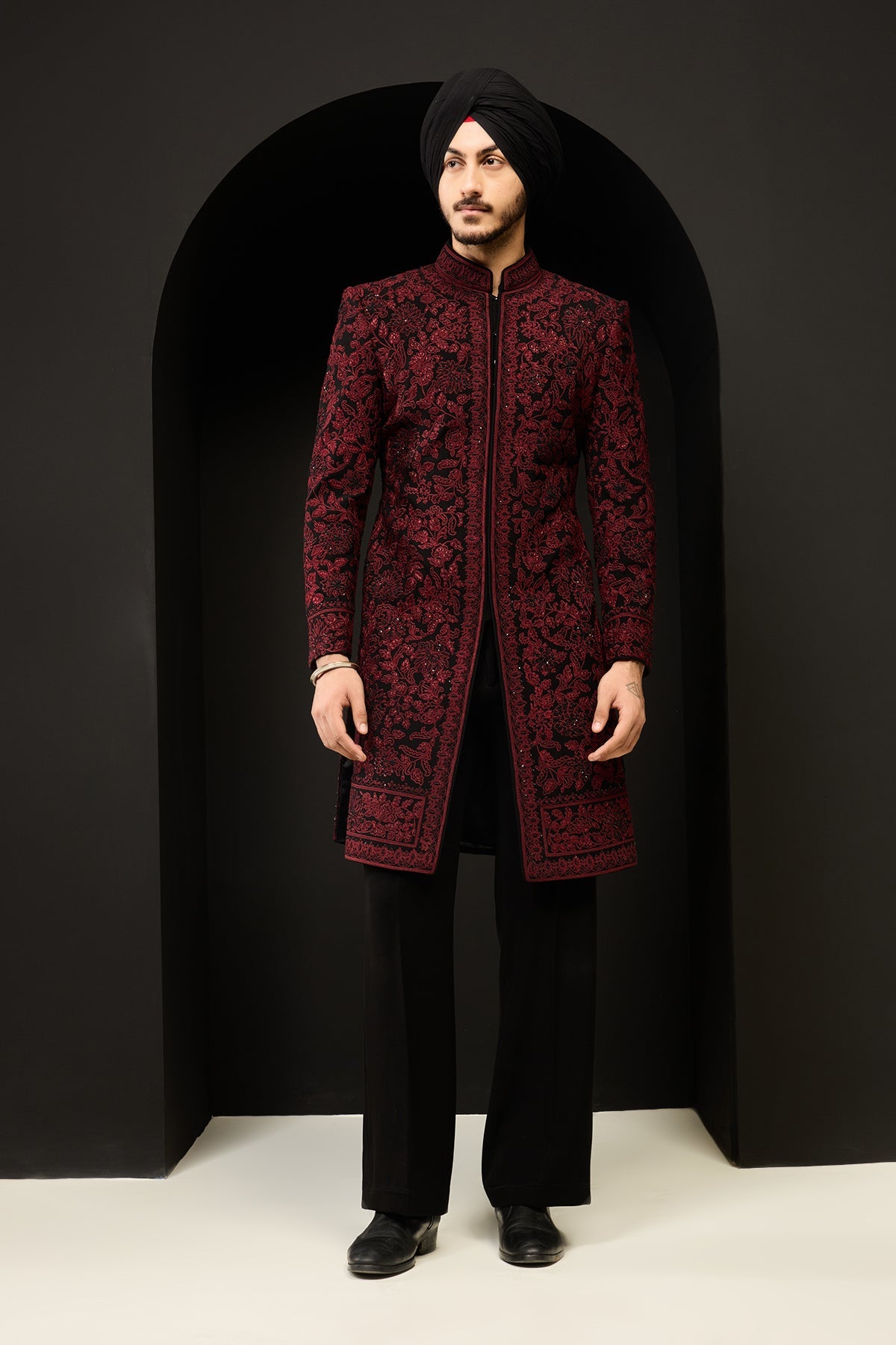 Black indo Western highlighting with sequins pearls and wine thread work