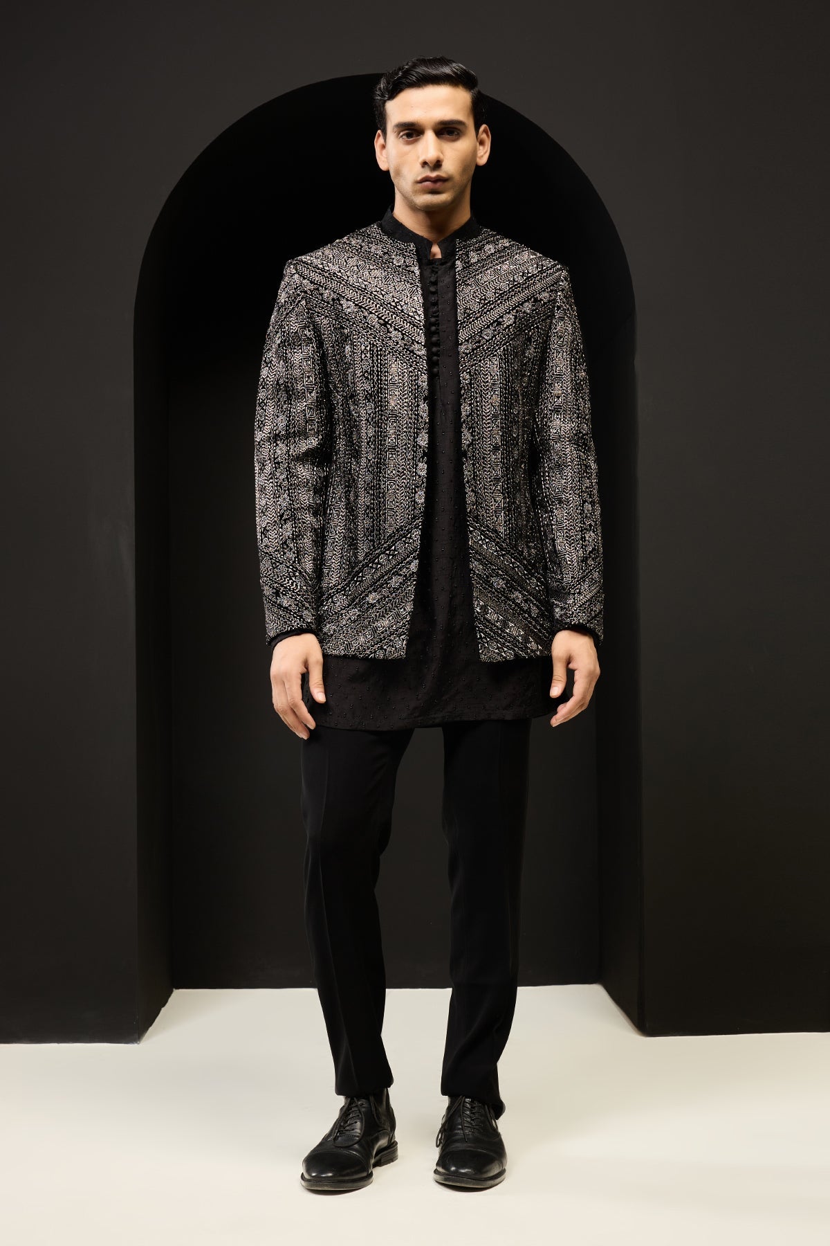 Black open bandhgala 
with silver zari sequins & pearl
work