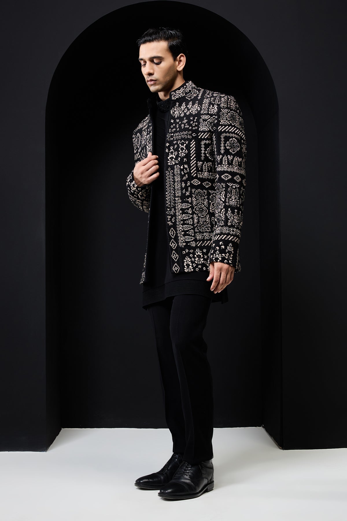 Black open bandhgala 
with thread sequins & pearl
work