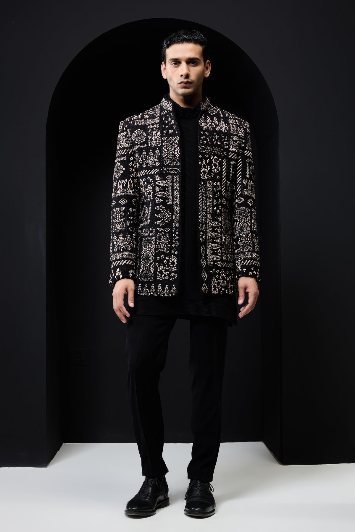 Black open bandhgala 
with thread sequins & pearl
work