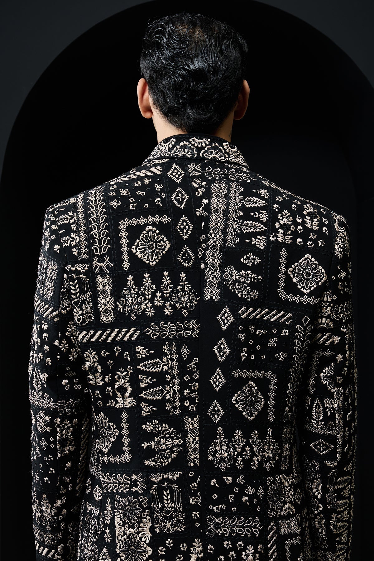 Black open bandhgala 
with thread sequins & pearl
work