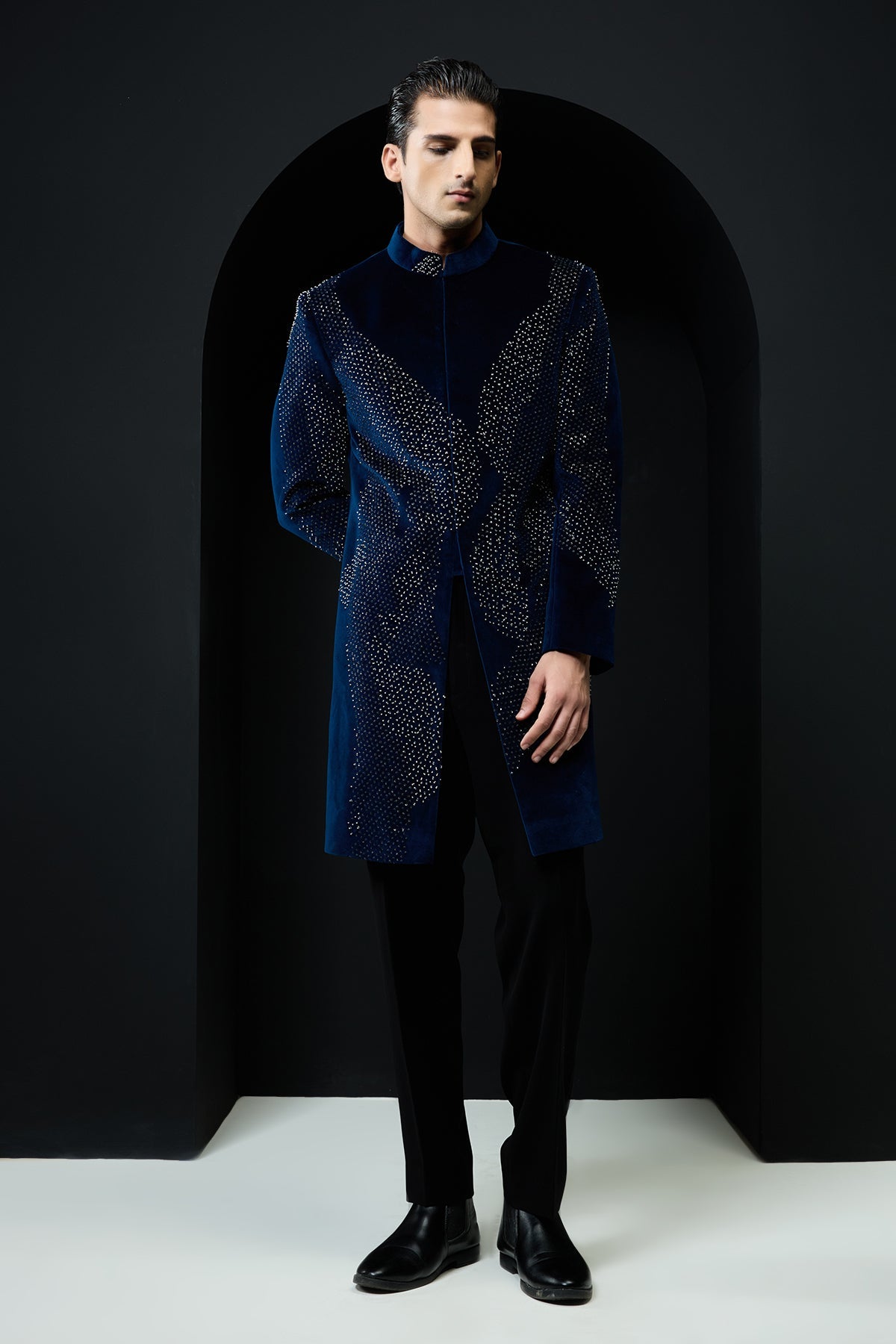 Teal blue Indo Western highlighted with sequins and pearls