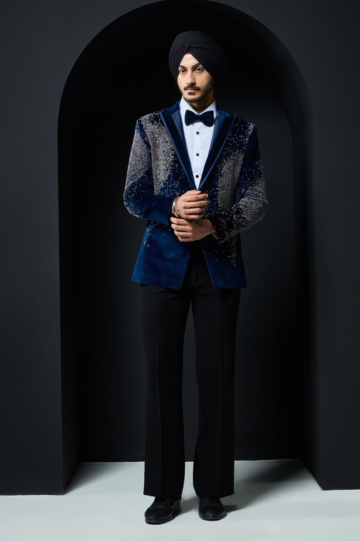Teal blue tuxedo highlighted with sequins pearls and cutdana