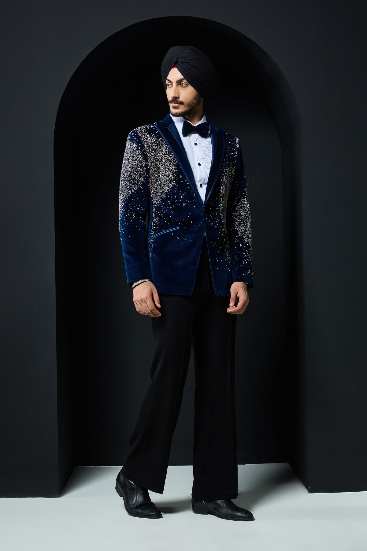 Teal blue tuxedo highlighted with sequins pearls and cutdana