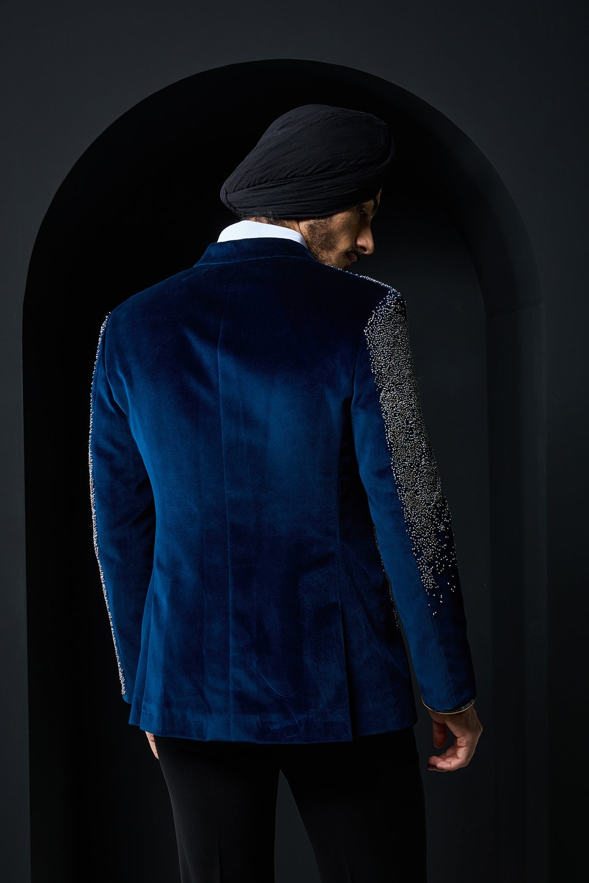 Teal blue tuxedo highlighted with sequins pearls and cutdana