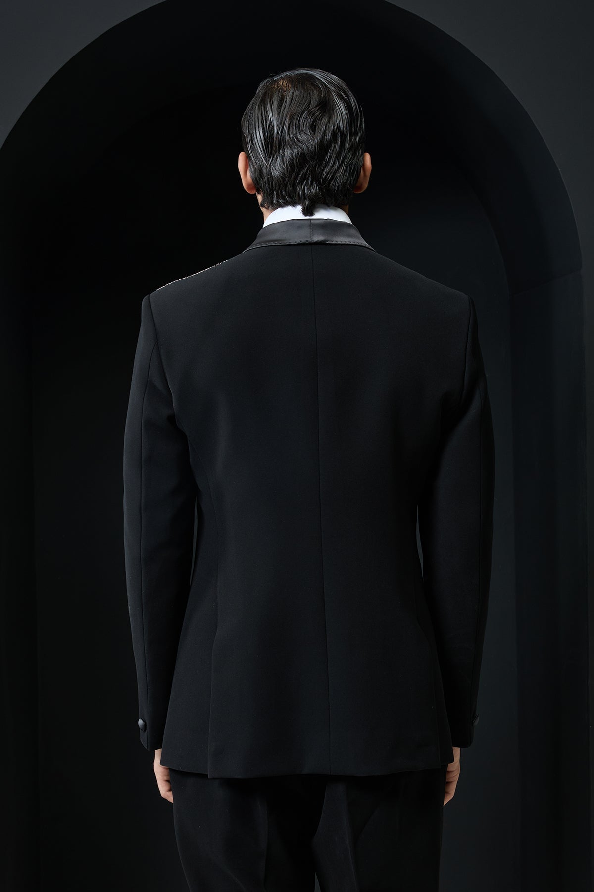 Black tuxedo highlighted with silver zari cutdana and peals