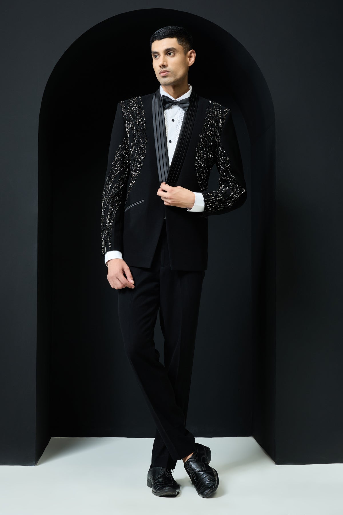 Black tuxedo highlighted with pearls and cutdana