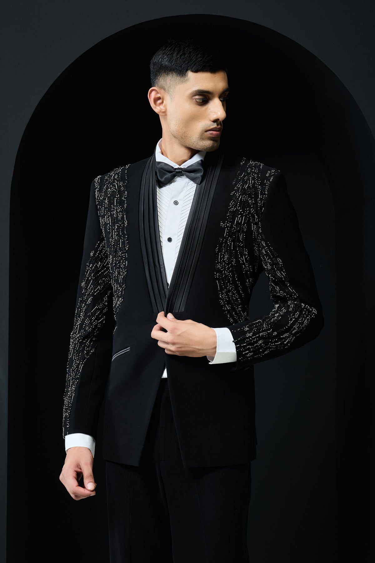 Black tuxedo highlighted with pearls and cutdana