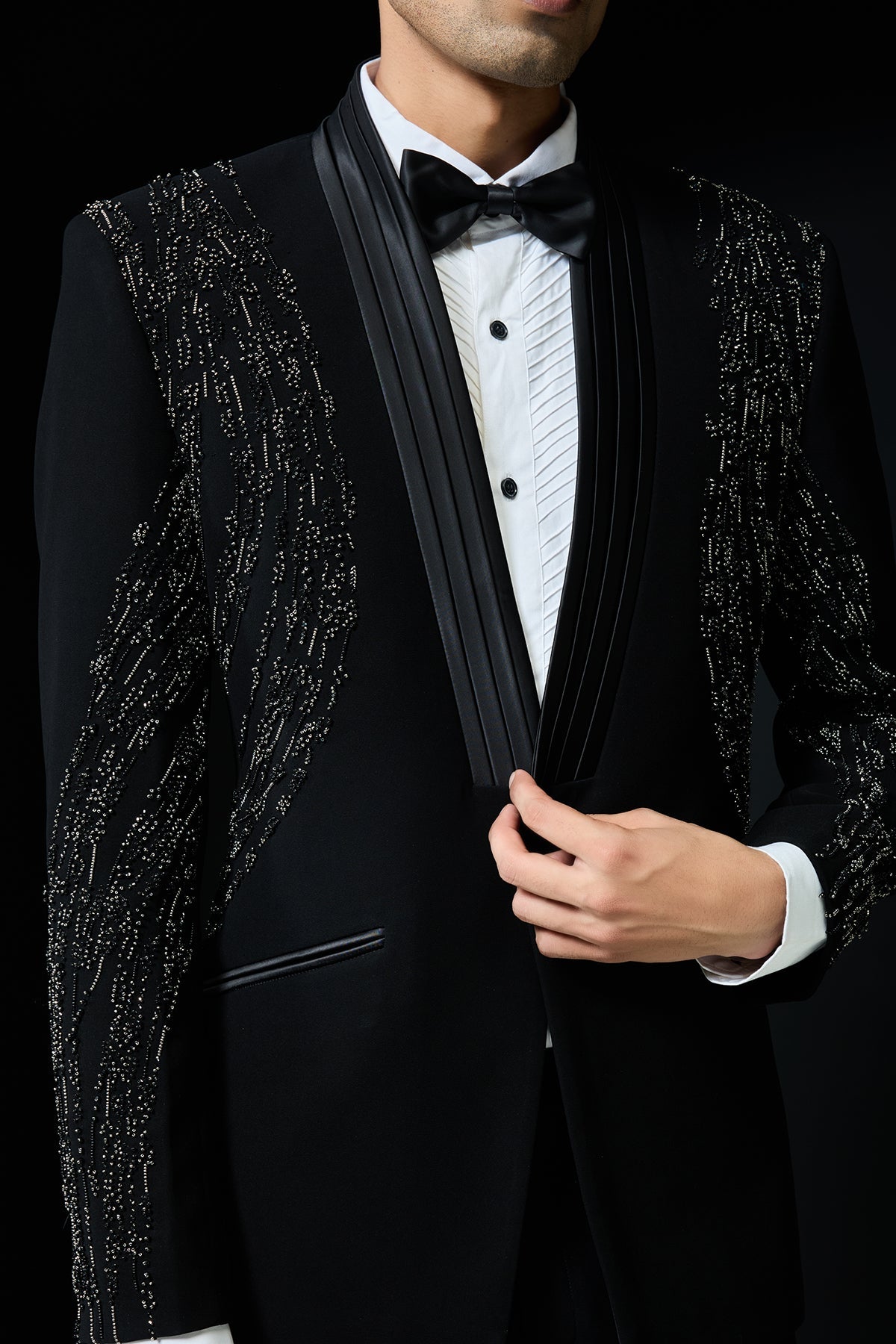 Black tuxedo highlighted with pearls and cutdana