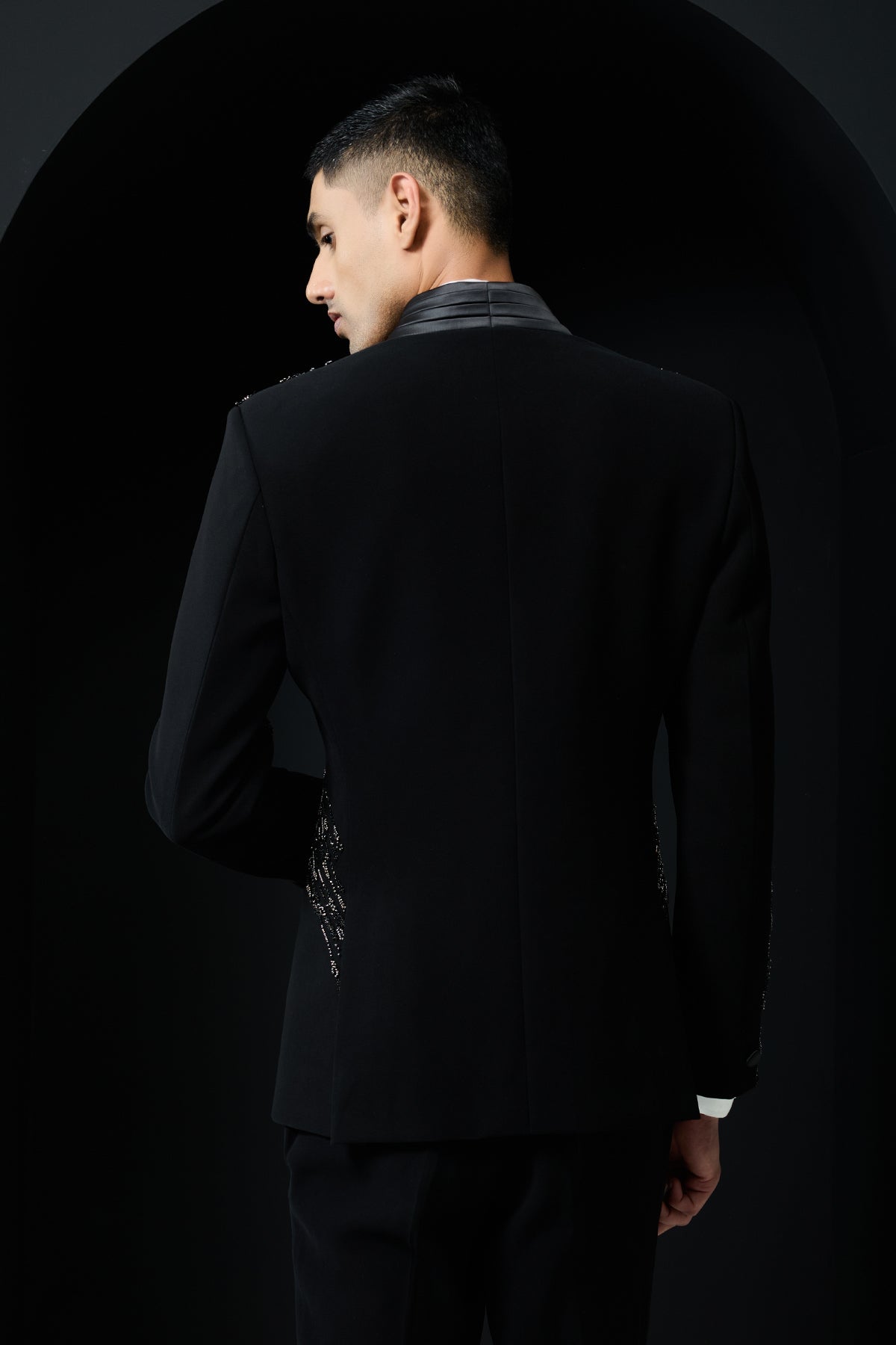 Black tuxedo highlighted with pearls and cutdana