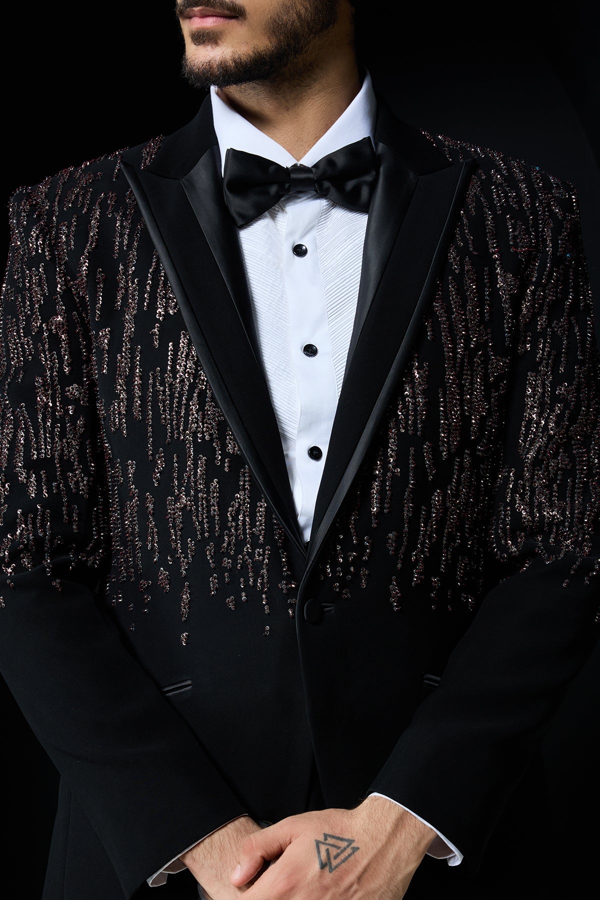 Black tuxedo highlighted with pearls sequins and thread work