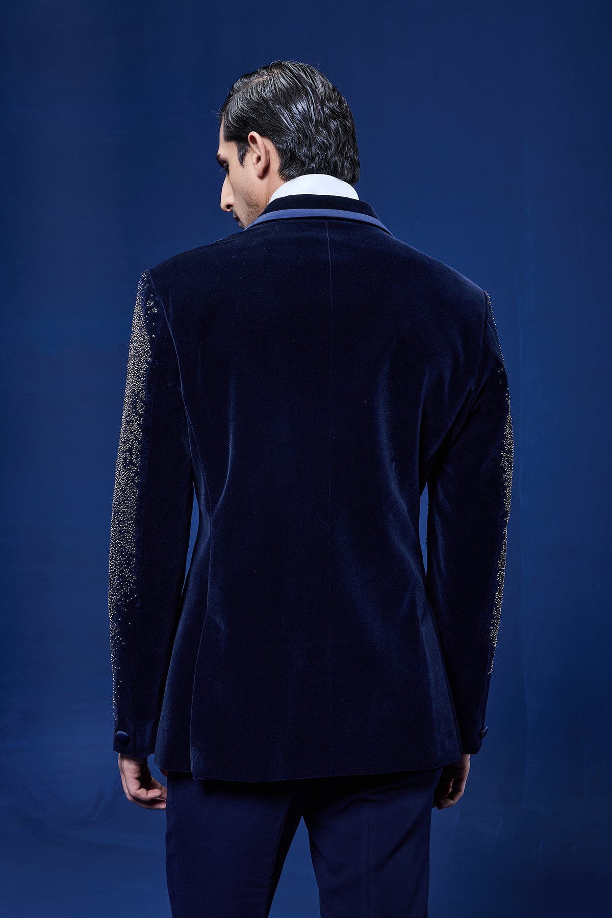 Navy Blue tuxedo highlighted with pearls and sequins