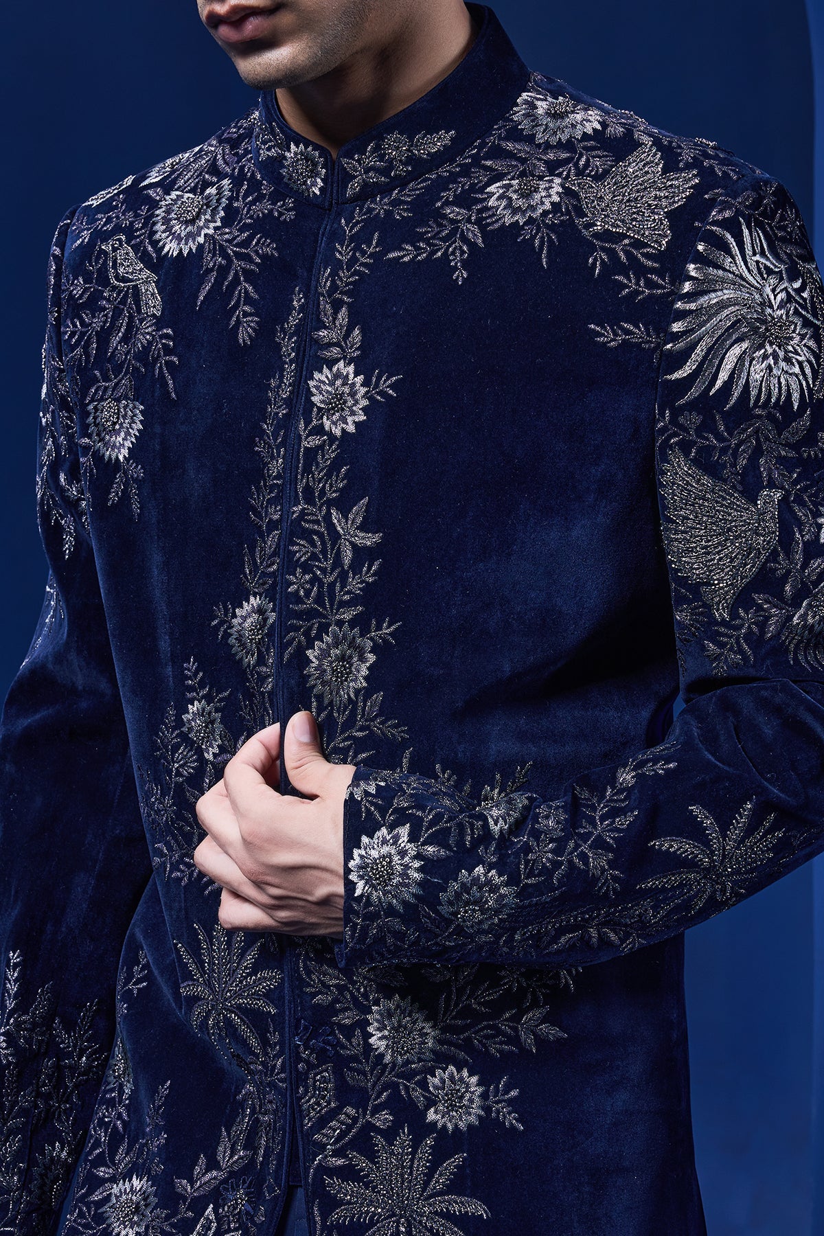 Navy blue Indo Western highlighted with silver zari pearl and cutdana