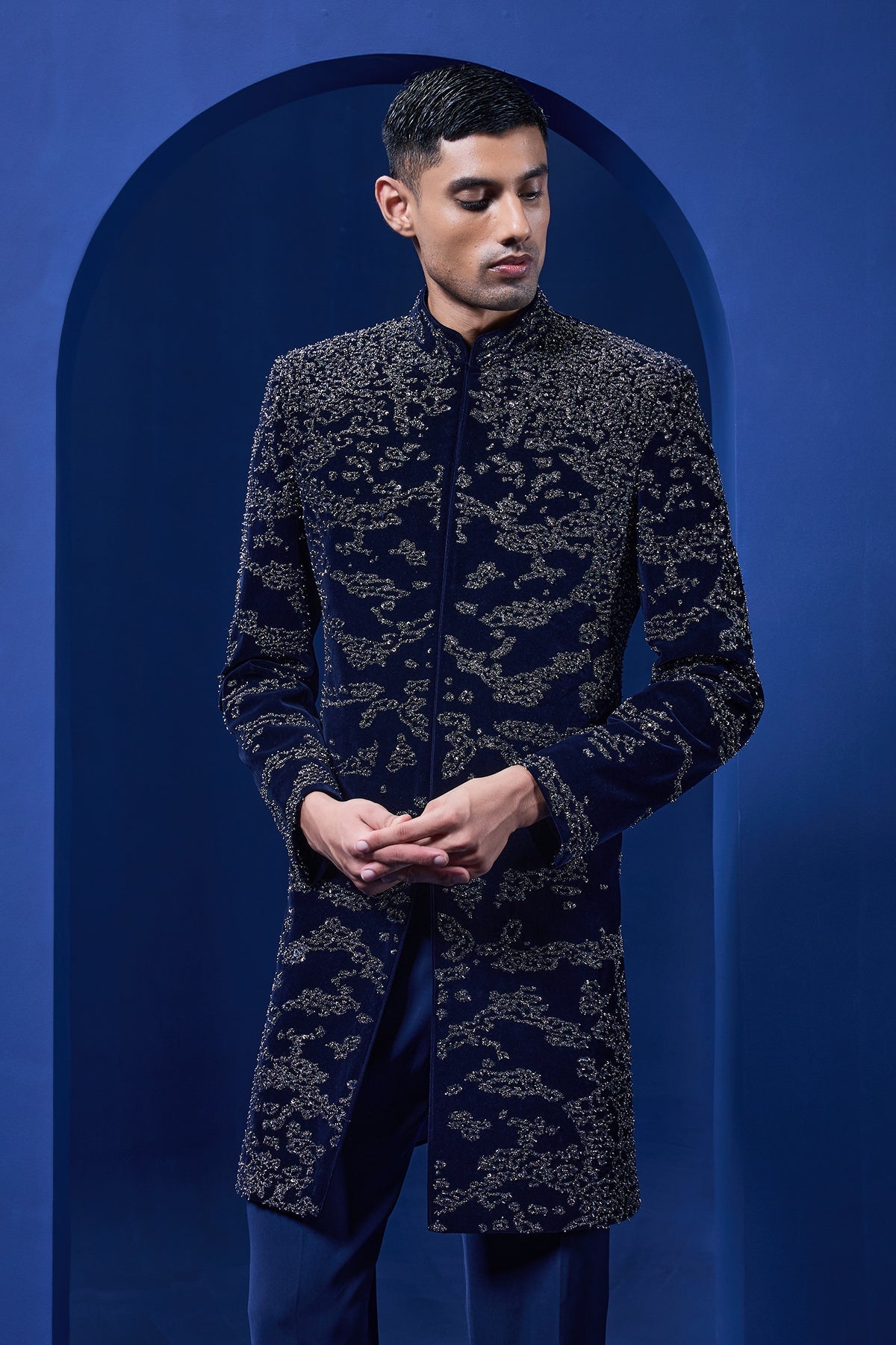 Navy blue Indo Western highlighted with silver zari sequins pearl and cutdana