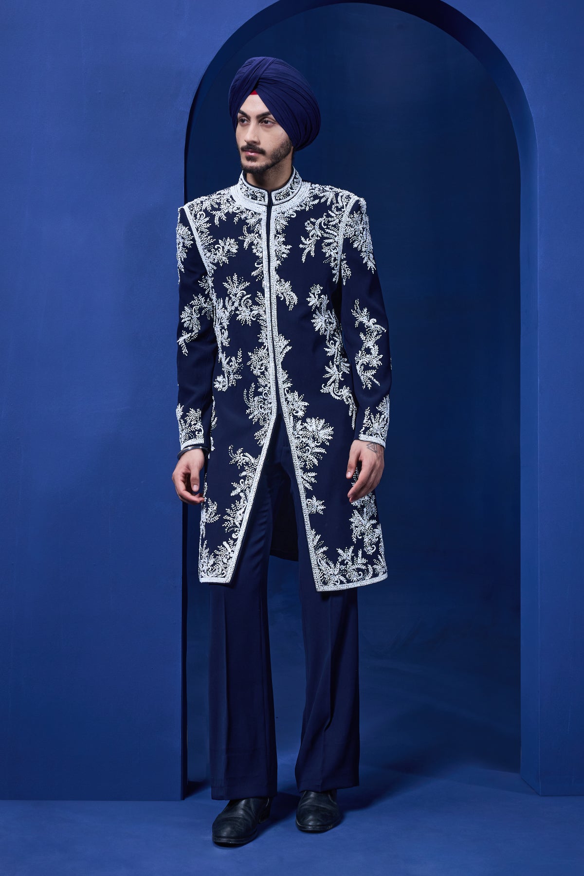 Navy blue Indo Western highlighted with sequins pearls cutdana and spring thread work