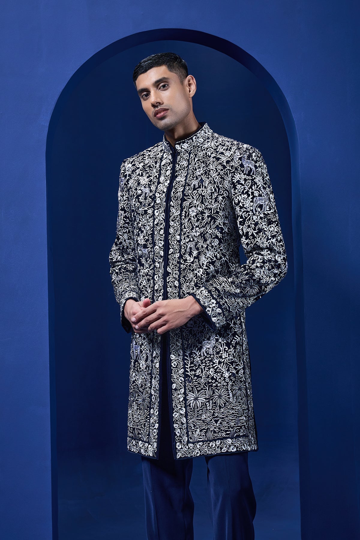 Navy blue Indo Western highlighted with sequins pearls and thread work