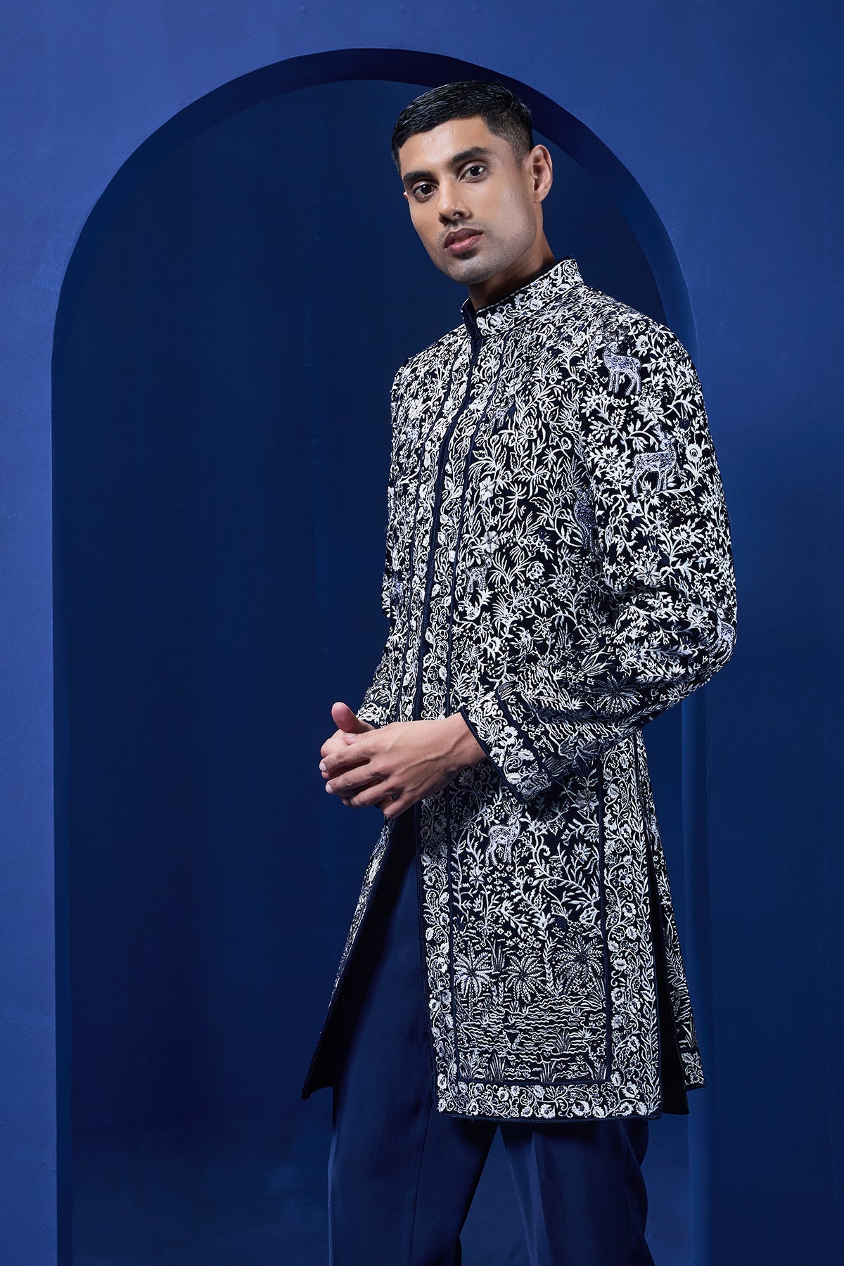 Navy blue Indo Western highlighted with sequins pearls and thread work