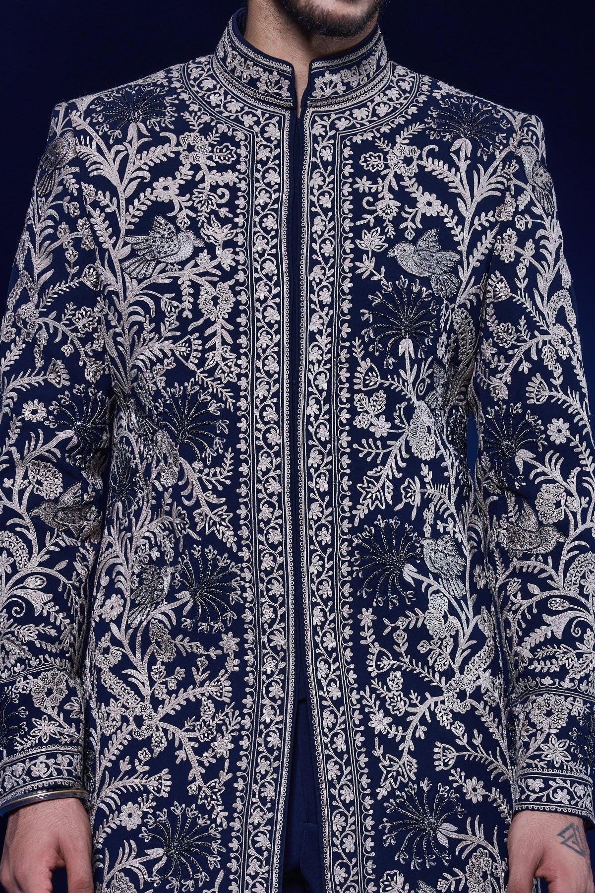 Navy blue Indo Western highlighted with sequins pearls and thread work