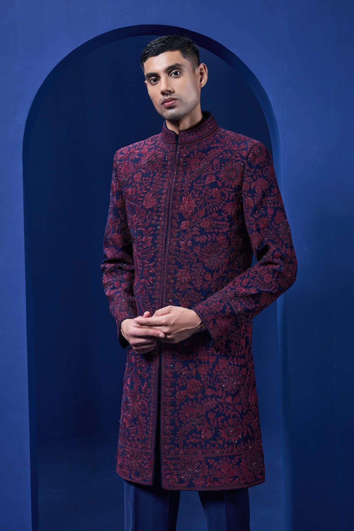 Navy blue Indo Western highlighted with sequins pearls and wine thread work
