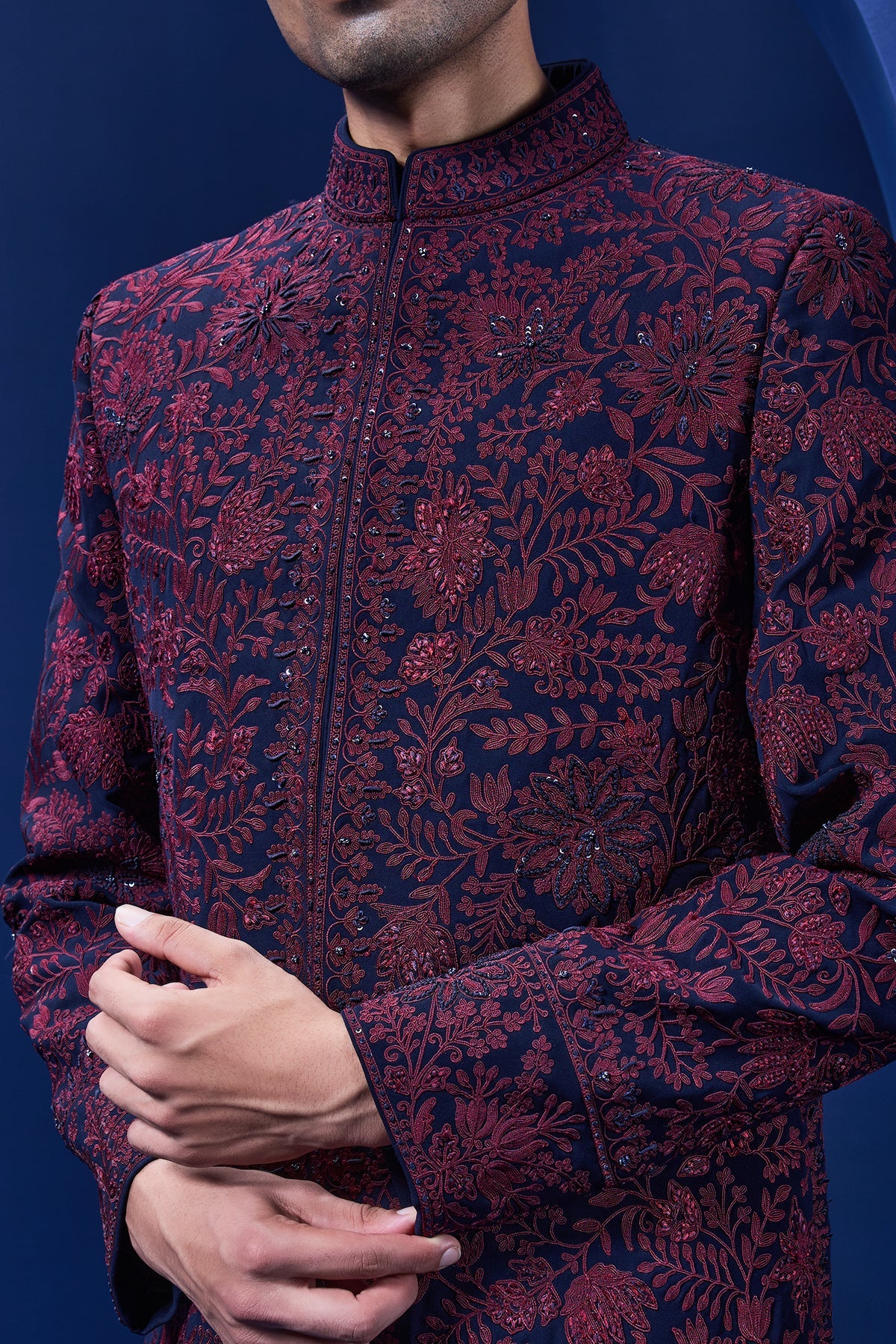 Navy blue Indo Western highlighted with sequins pearls and wine thread work